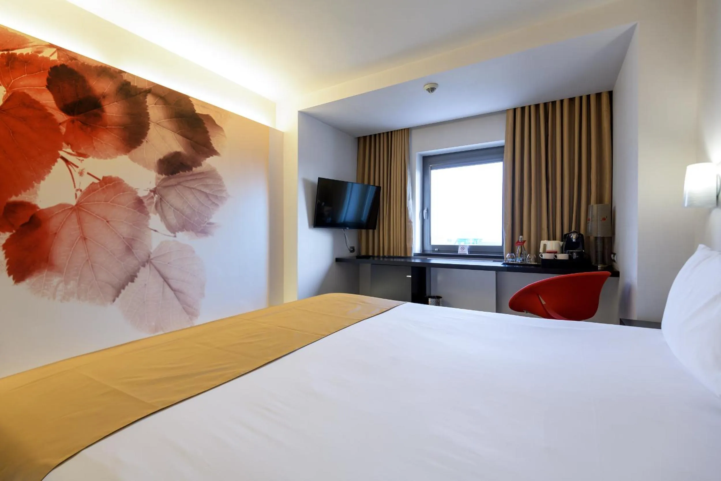 Bed in Ramada Plaza by Wyndham Bucharest Convention Center