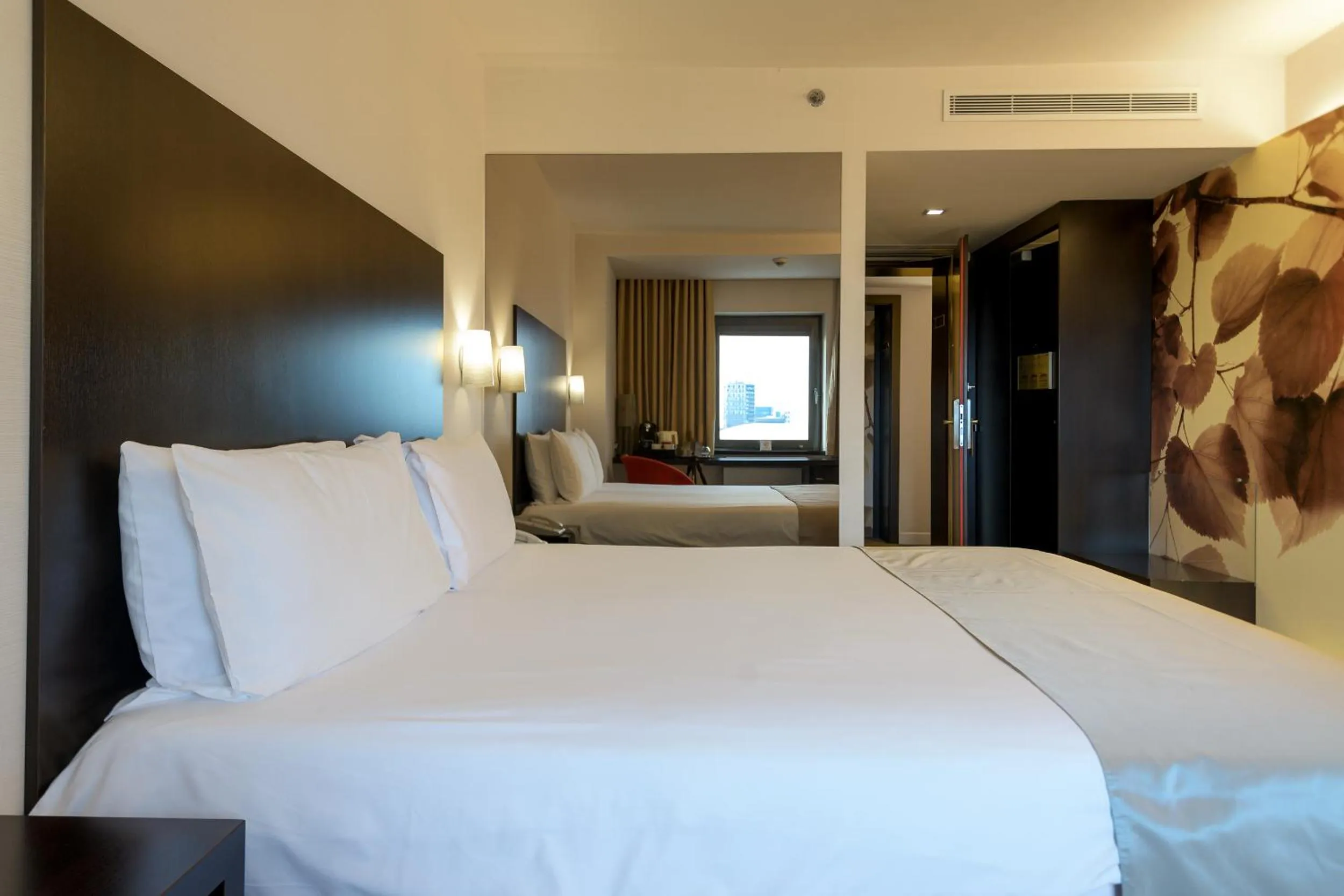 Bed in Ramada Plaza by Wyndham Bucharest Convention Center