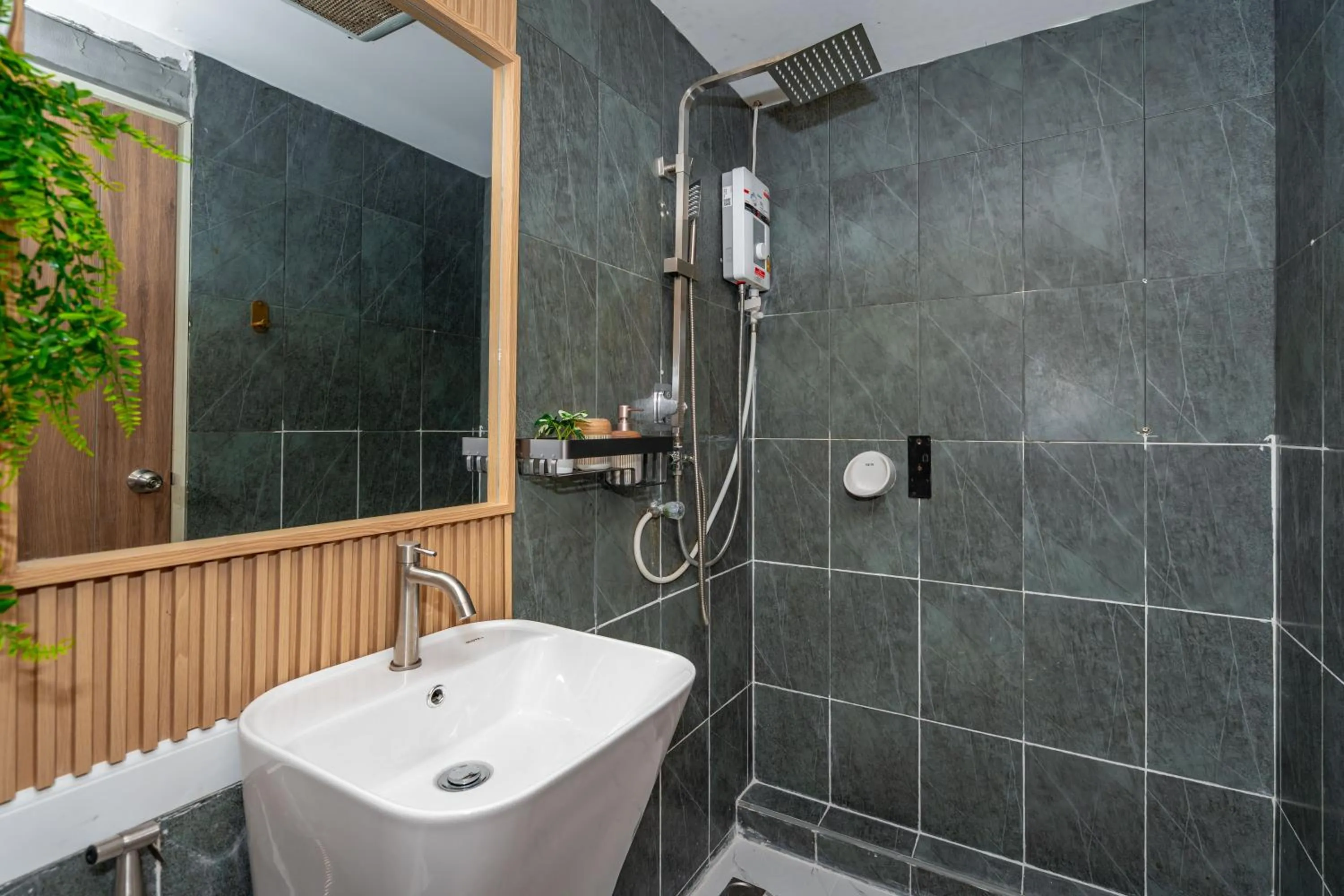 Shower in Kata Station Boutique Hotel