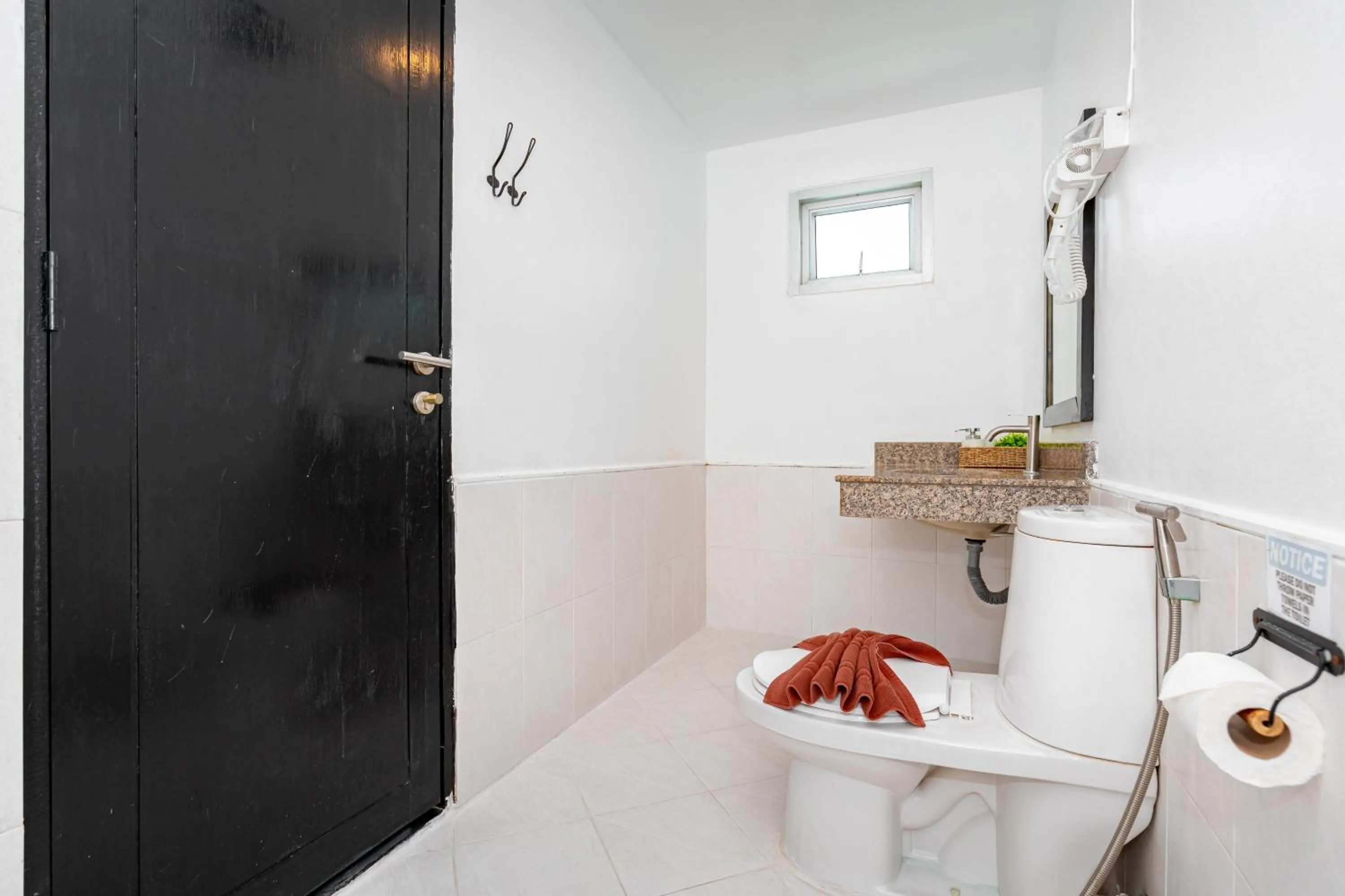 Toilet in Kata Station Boutique Hotel