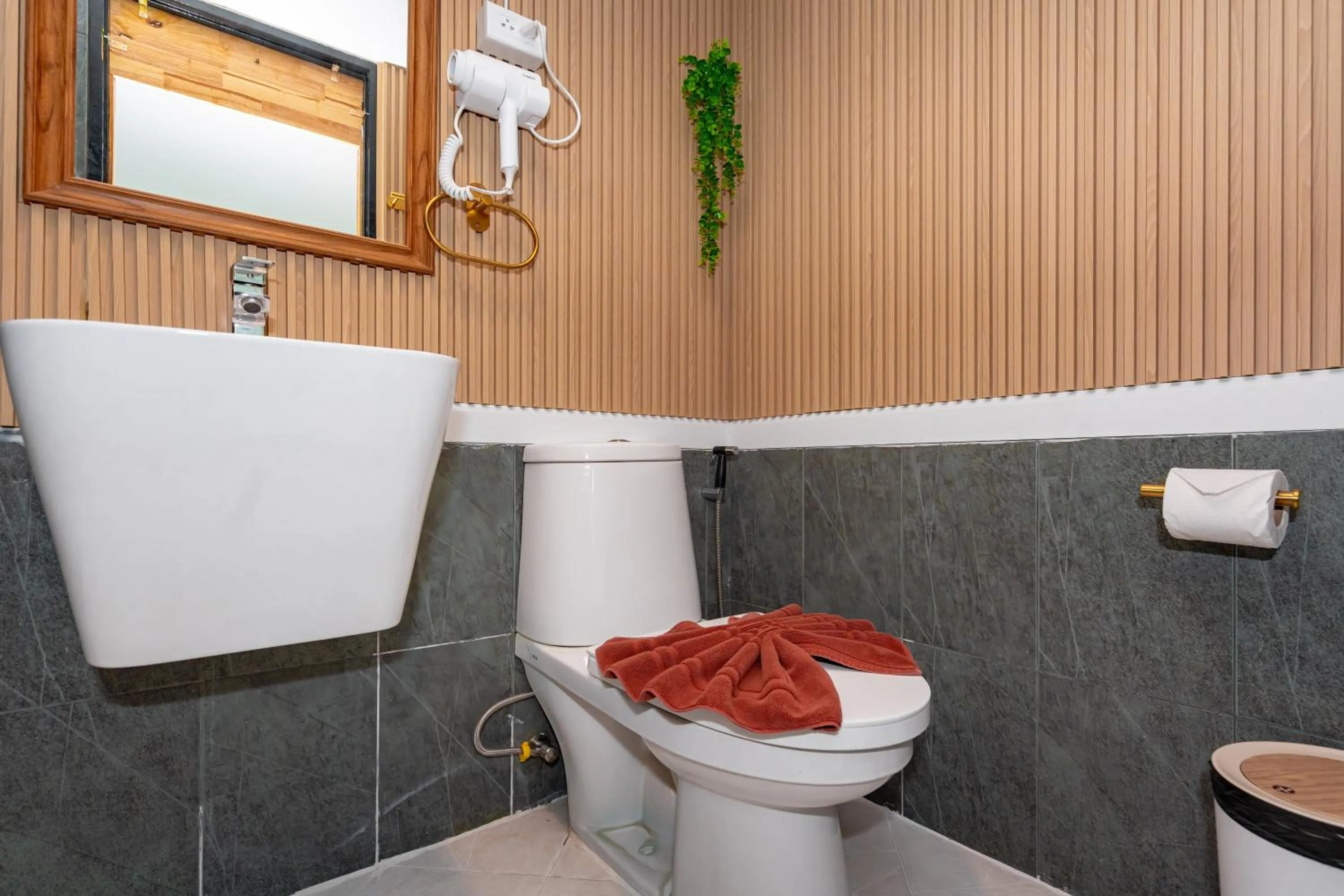 Toilet in Kata Station Boutique Hotel