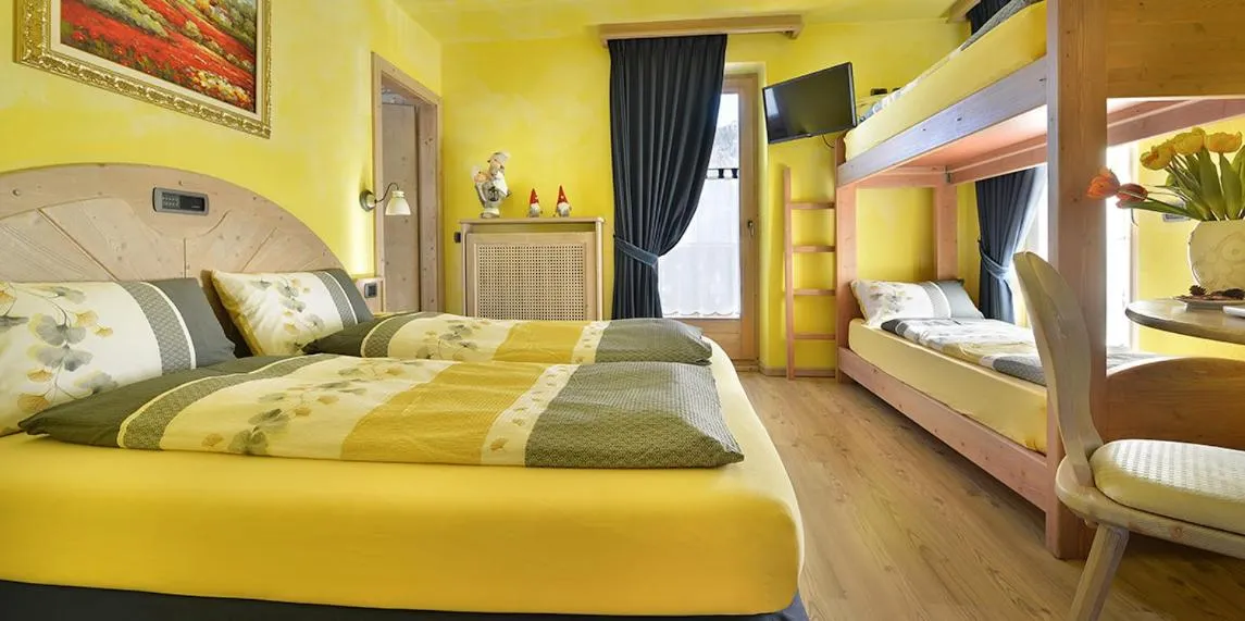 Bed in Hotel Piccolo Mondo