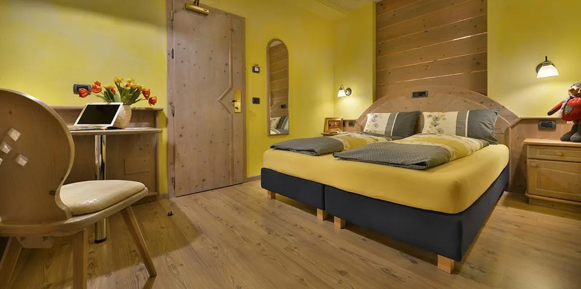 Bed in Hotel Piccolo Mondo