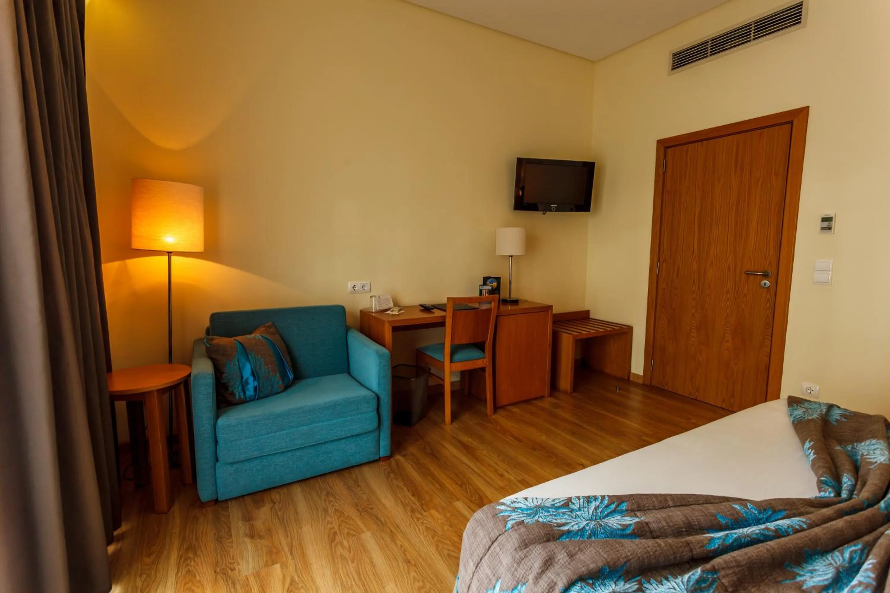 Bed in Hotel Caravelas