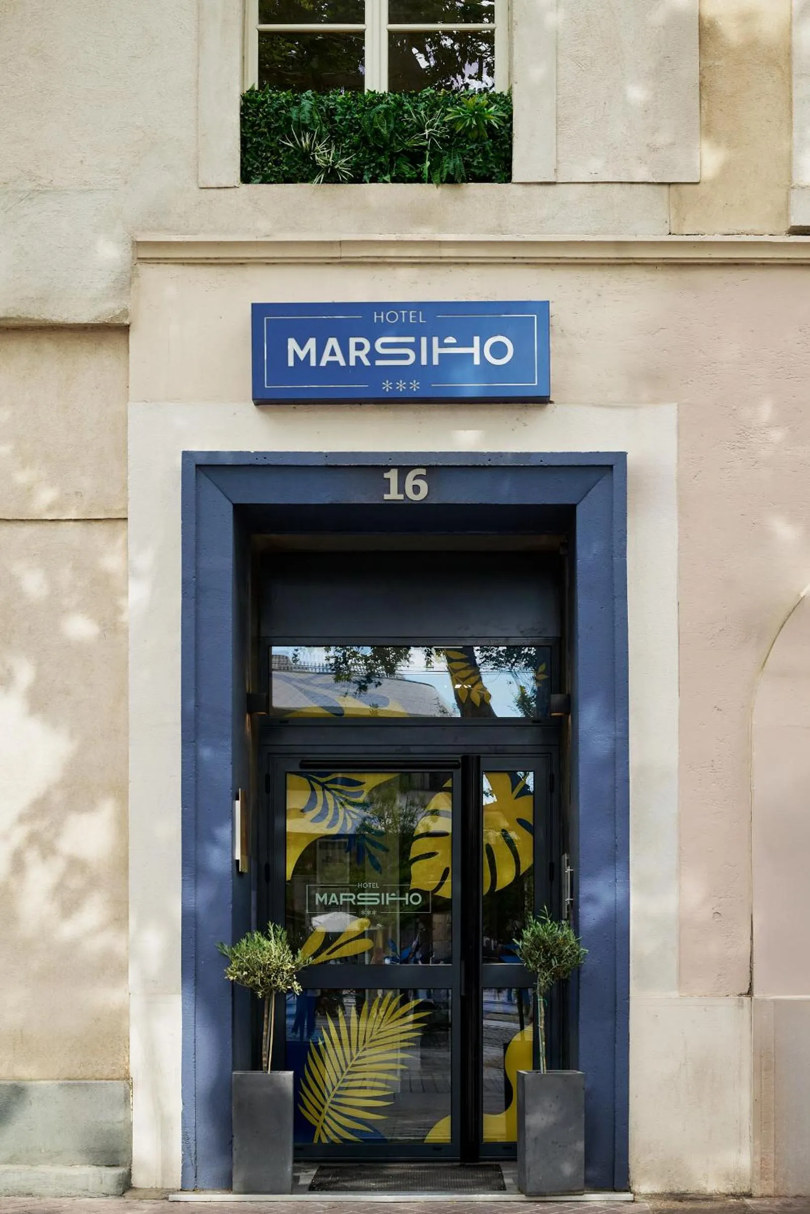 Facade/entrance in Hotel Marsiho by Happyculture