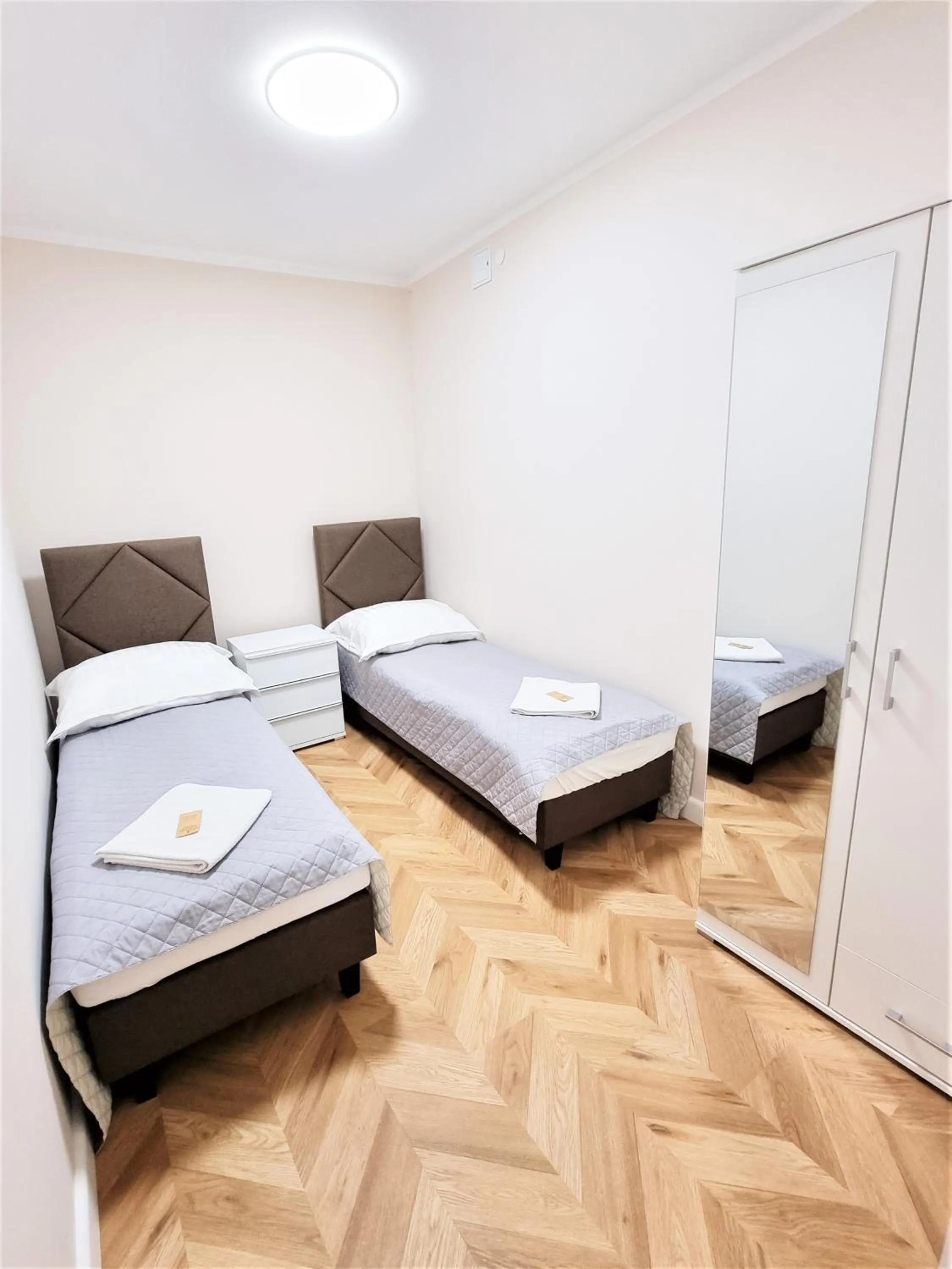 Bed in Orange Tree Hotel