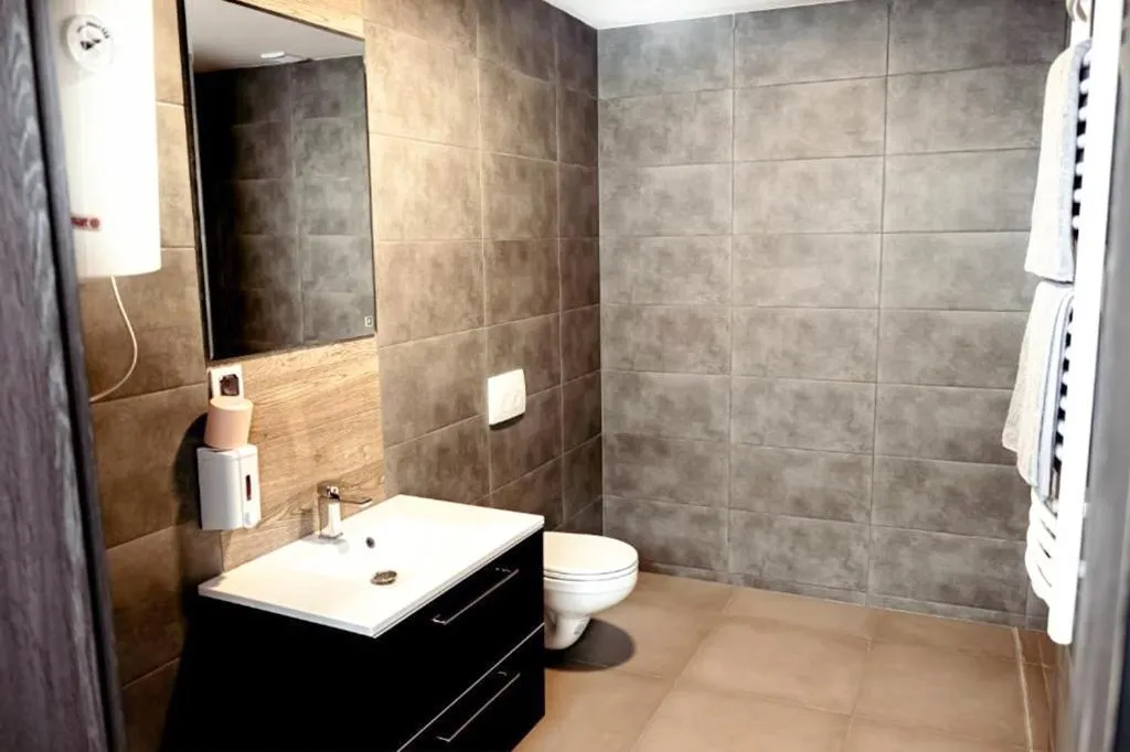 Toilet in Orange Tree Hotel