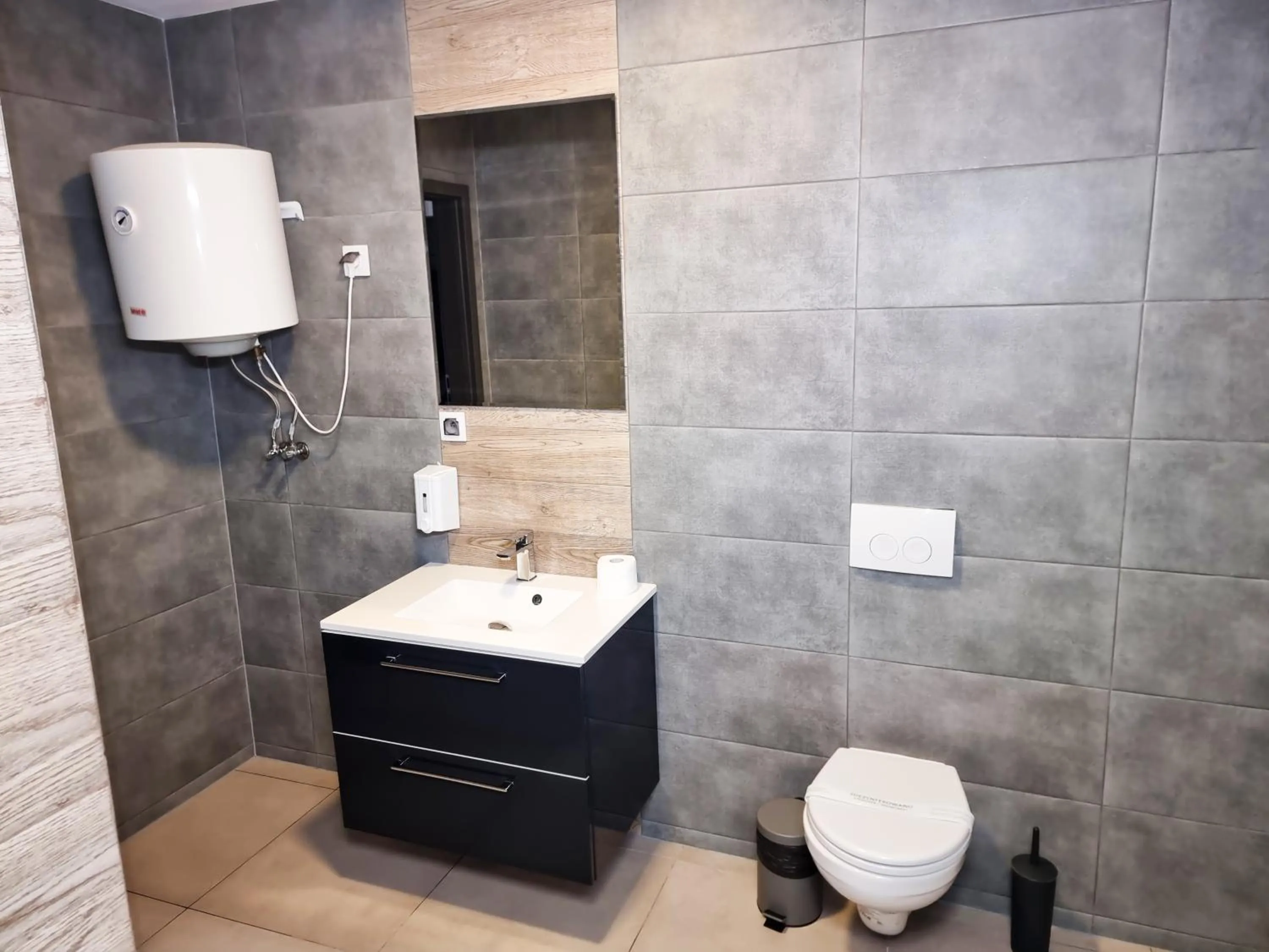 Toilet in Orange Tree Hotel