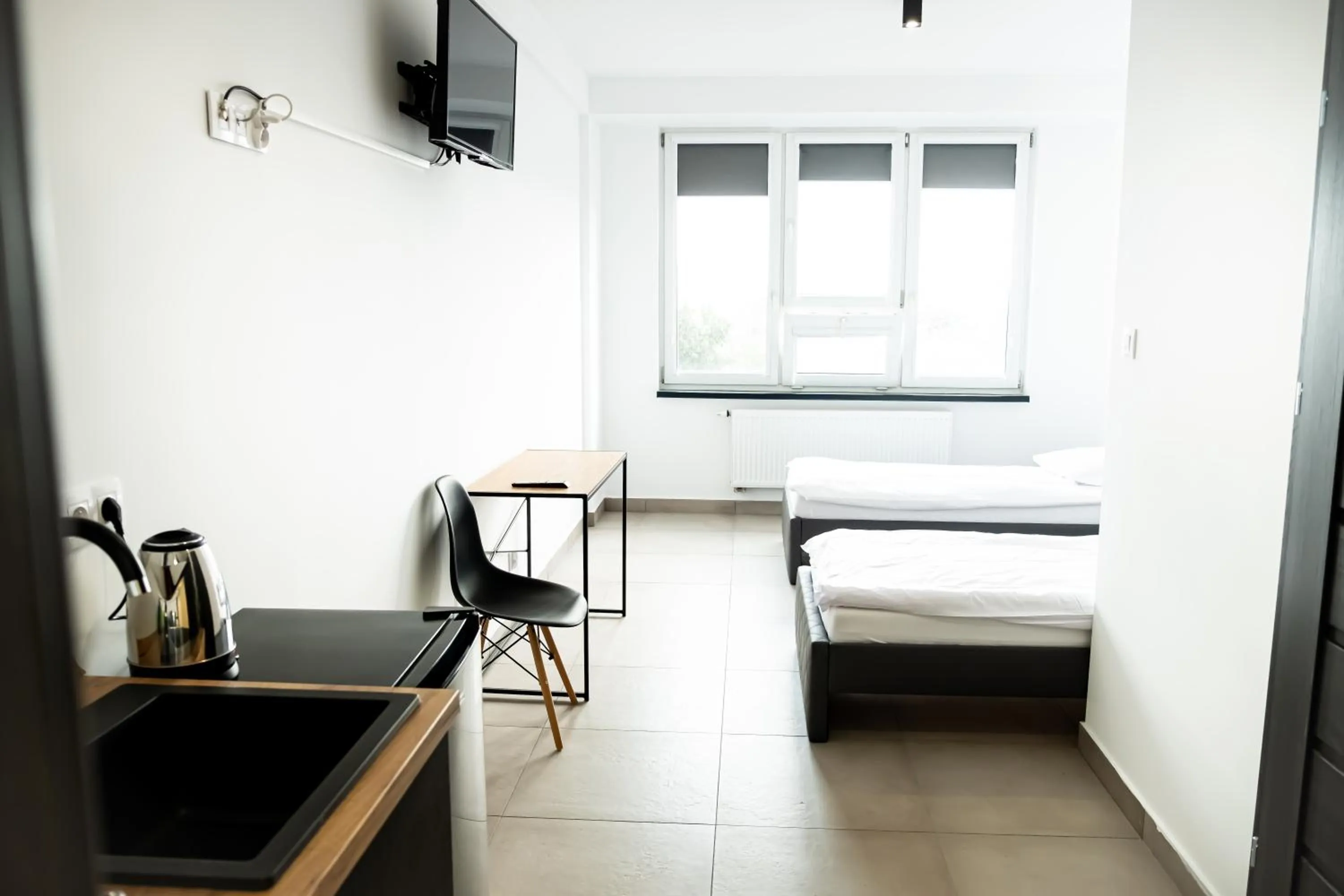 Bed in Orange Tree Hotel