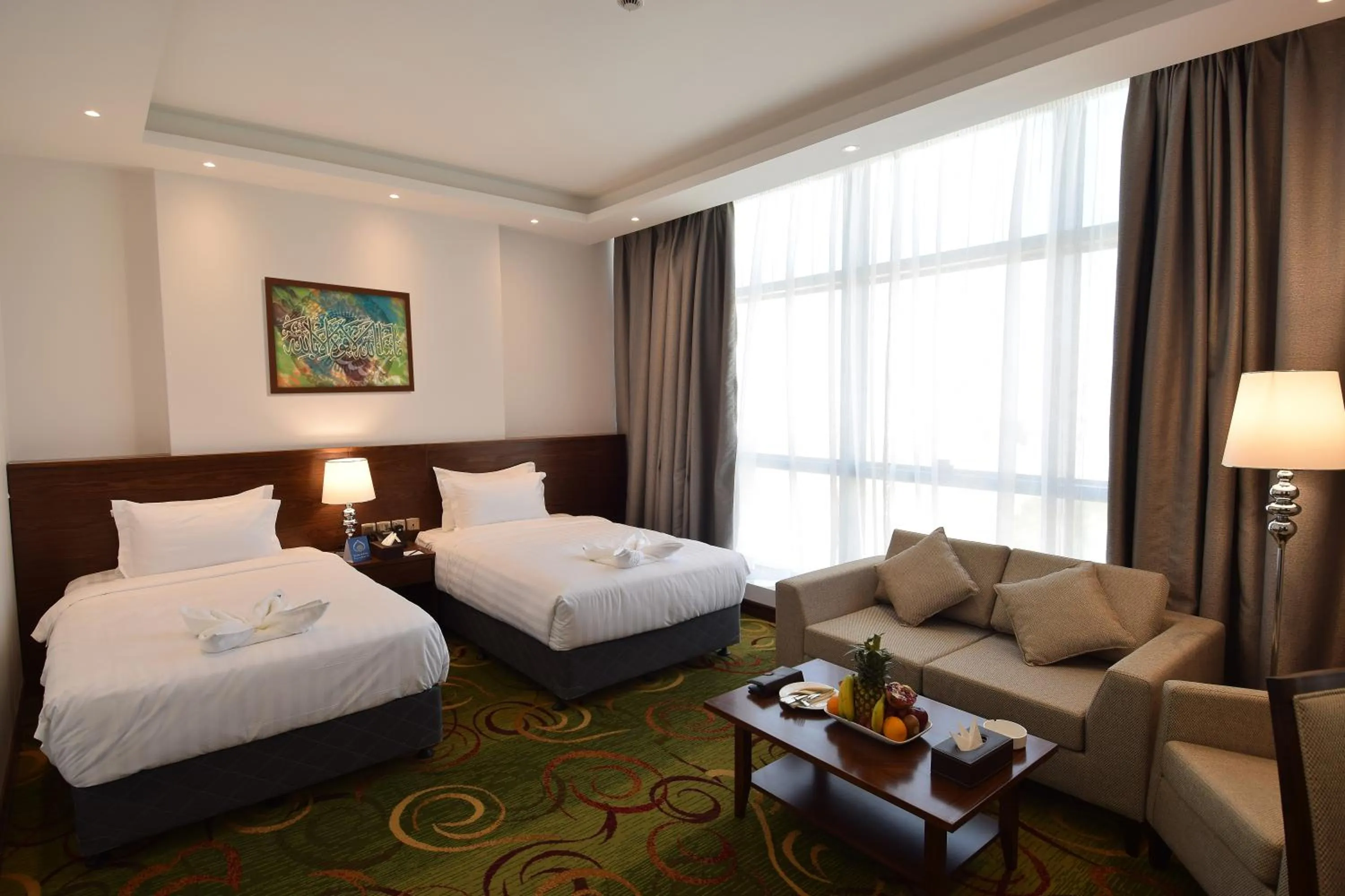 Photo of the whole room, Bed in Zaha Al Munawara Hotel