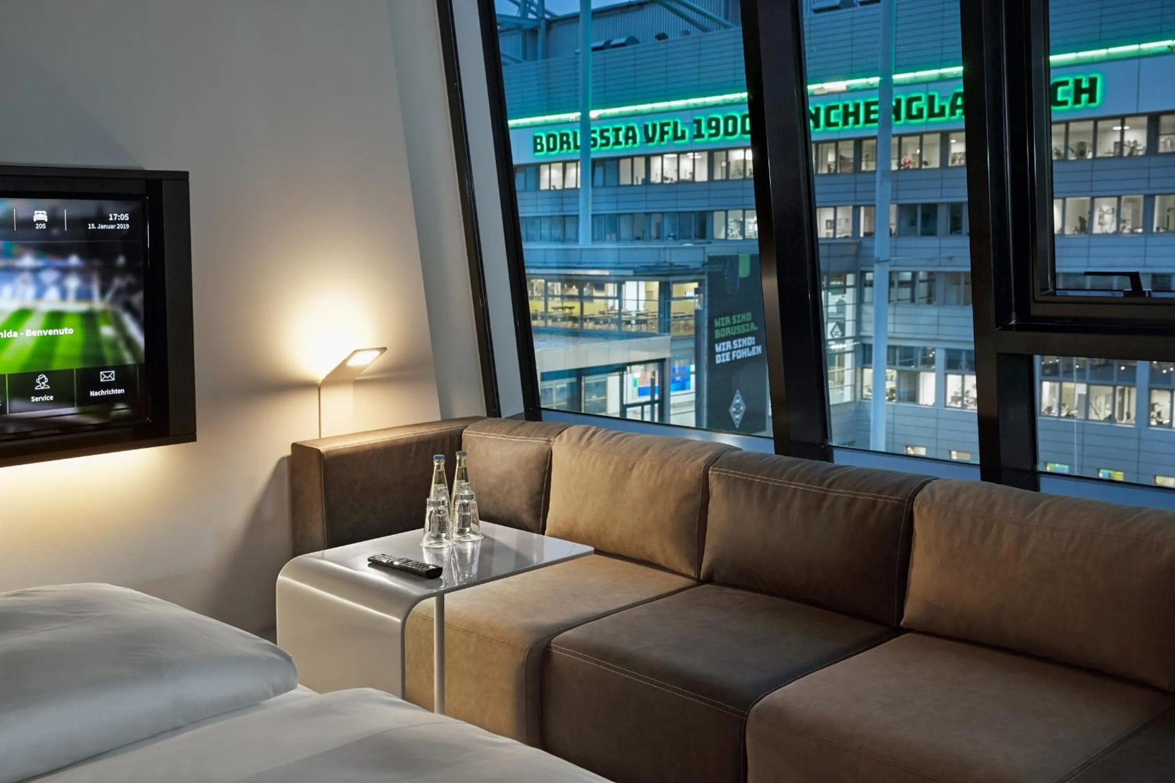 Photo of the whole room, Bed in H4 Hotel Mönchengladbach im BORUSSIA-PARK