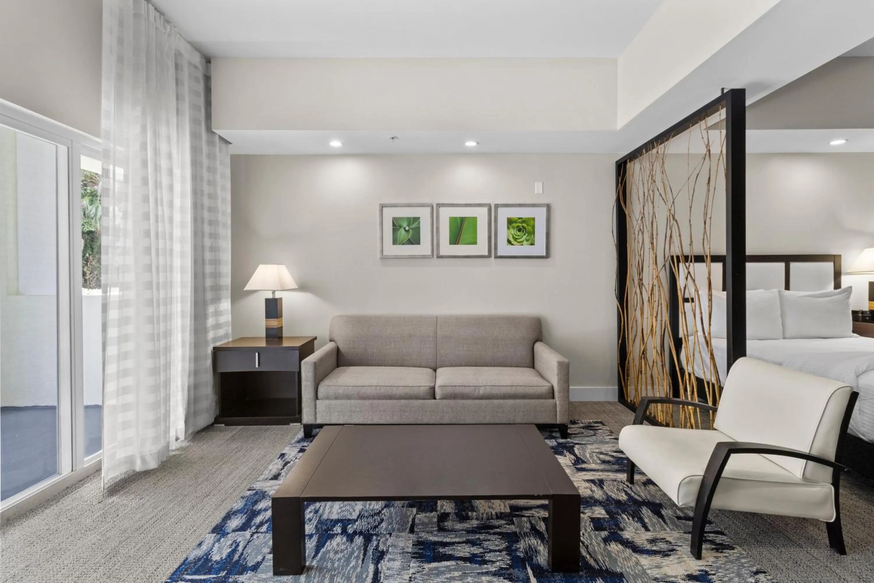 Seating area, Bed in Provident Doral At The Blue