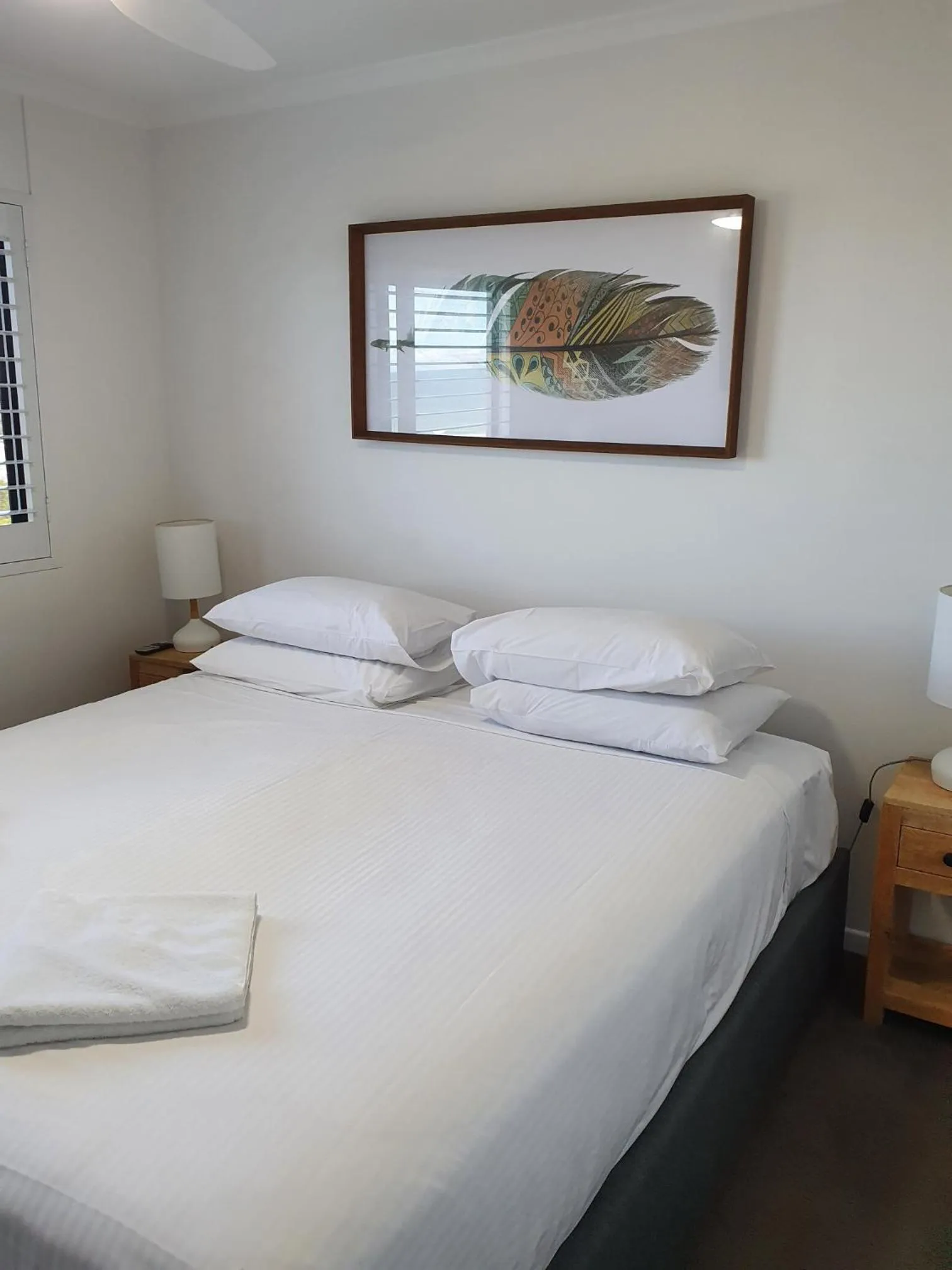 Bed in San Marino by the Sea Apartments