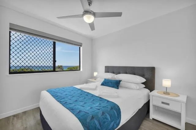 Bed in San Marino by the Sea Apartments