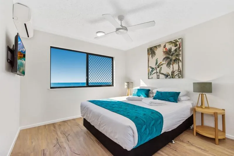 Bed in San Marino by the Sea Apartments