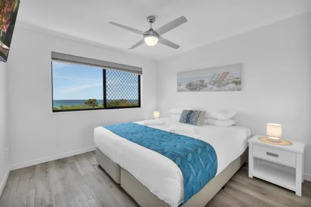 Bed in San Marino by the Sea Apartments