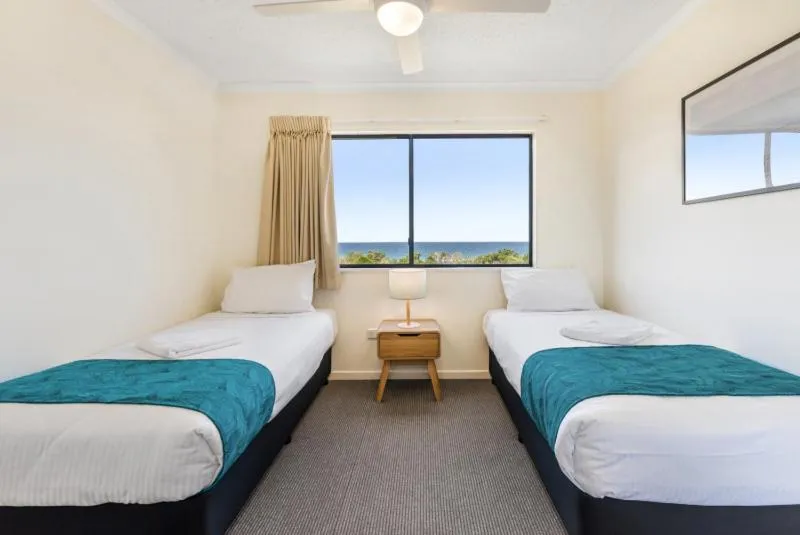 Bed in San Marino by the Sea Apartments