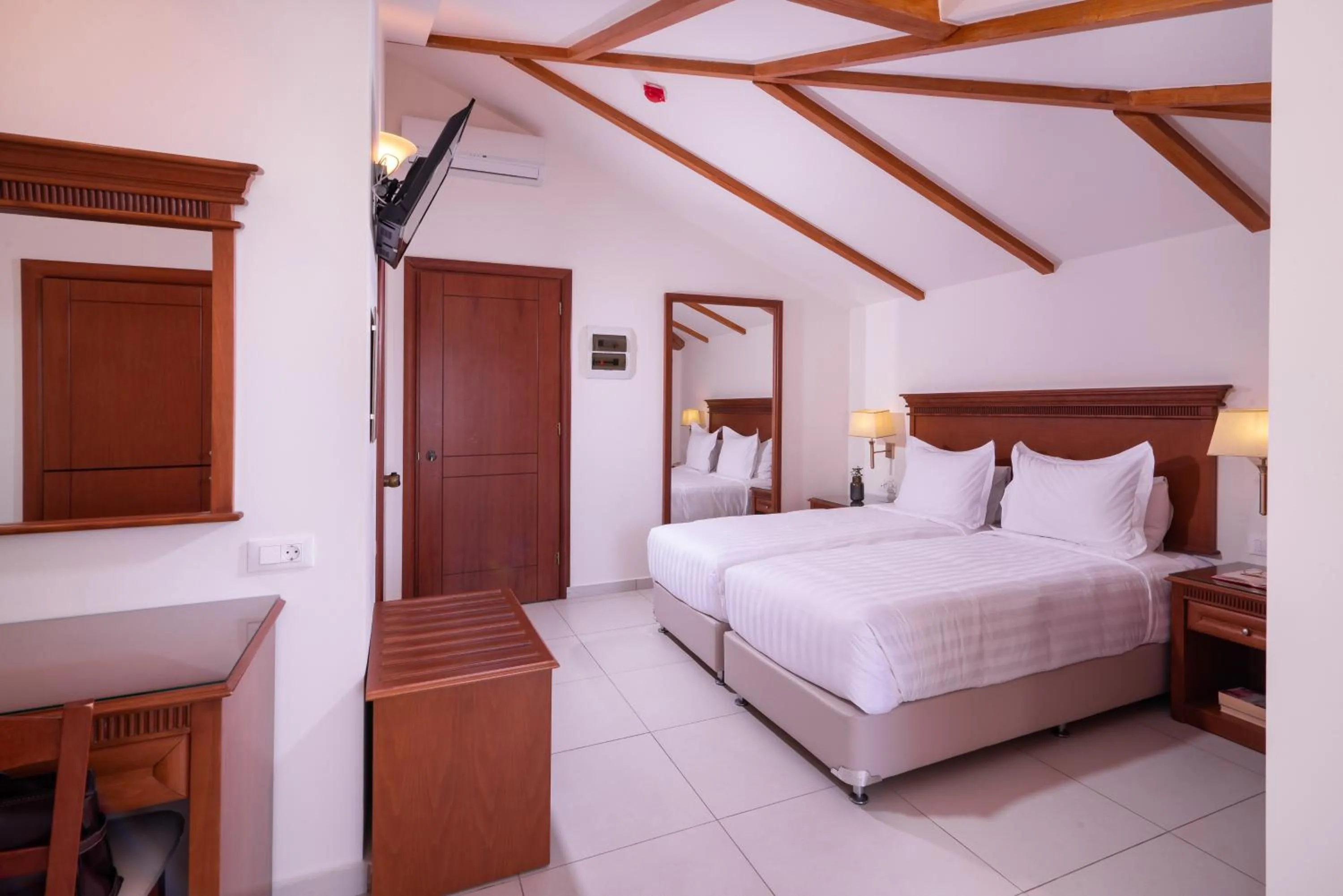 Bed in Avalon Palace Hotel