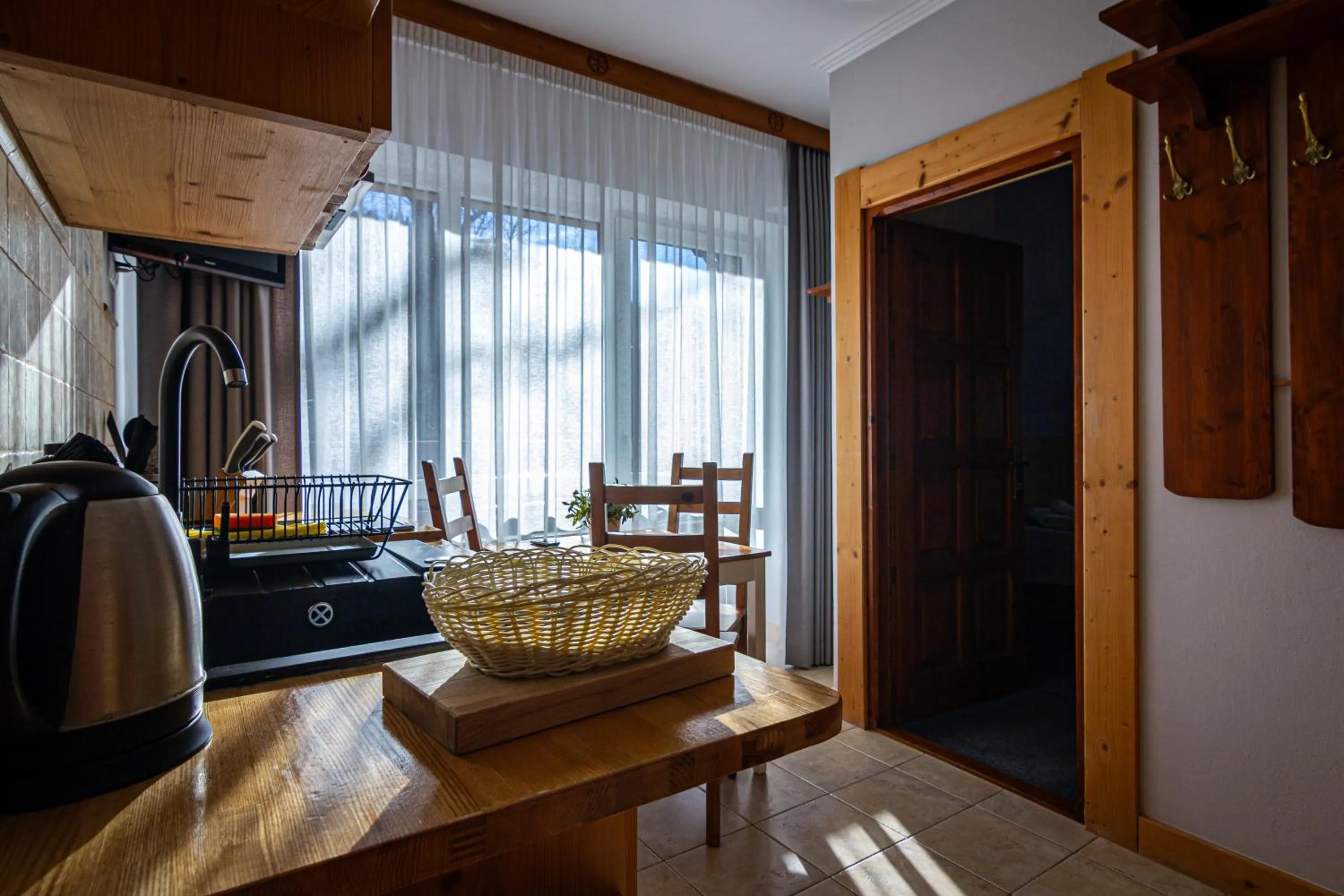 Kitchen or kitchenette in Aparthotel Pod Nosalem