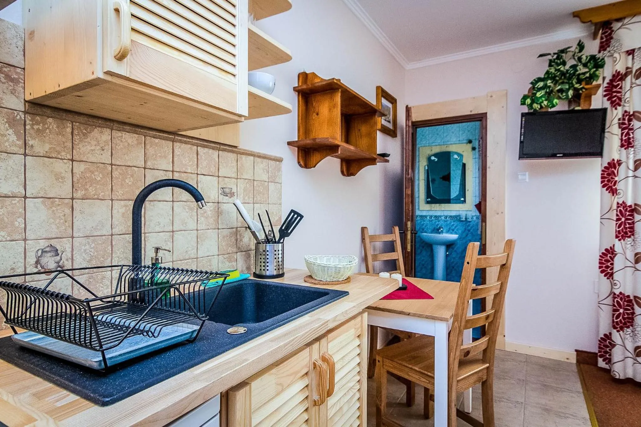 Kitchen or kitchenette in Aparthotel Pod Nosalem