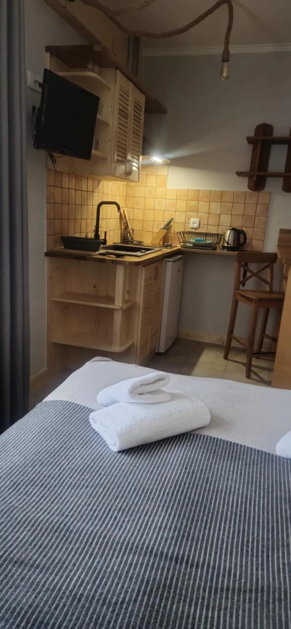 Kitchen or kitchenette, Bed in Aparthotel Pod Nosalem