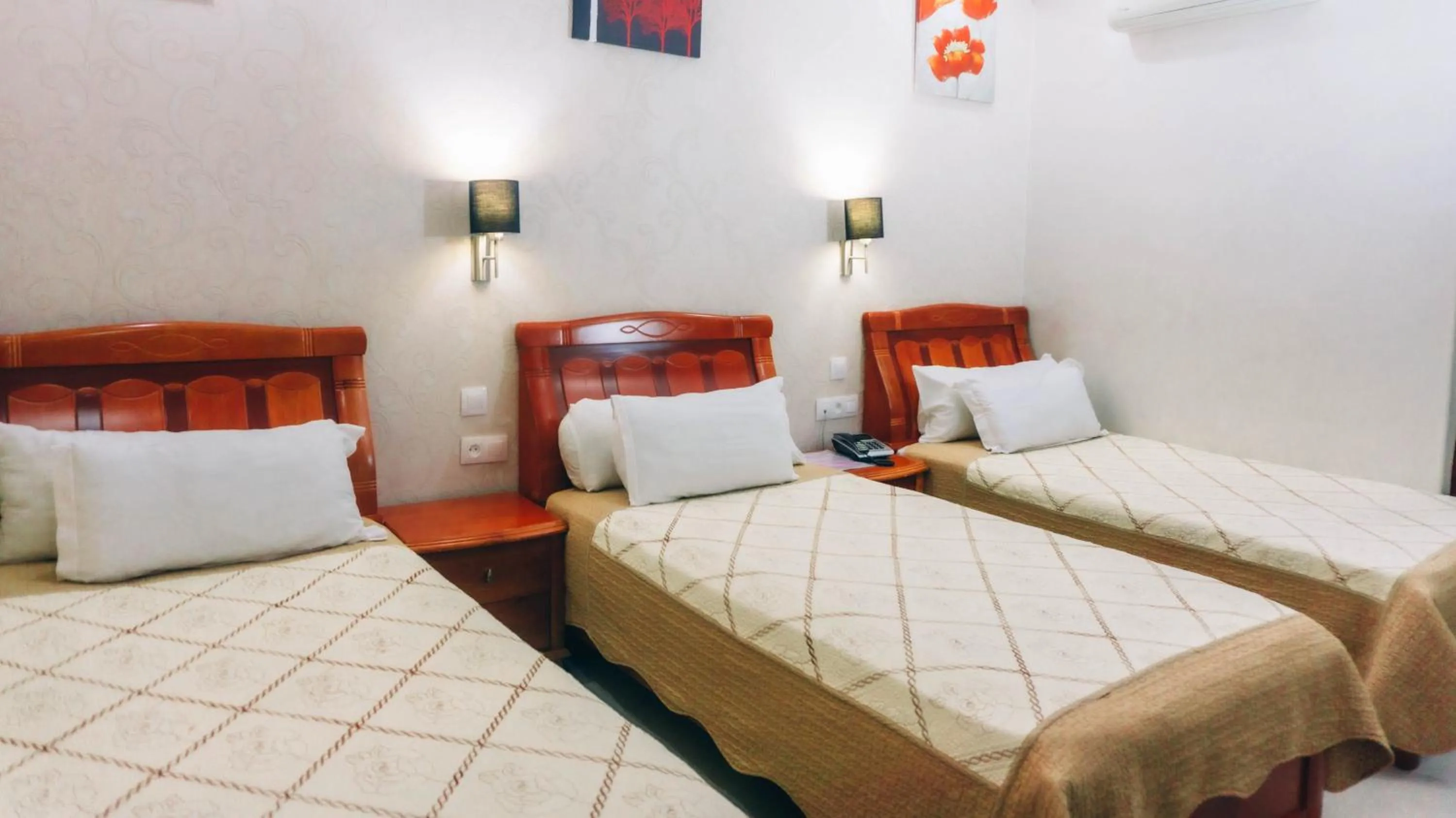 Bed in Hôtel Atenas