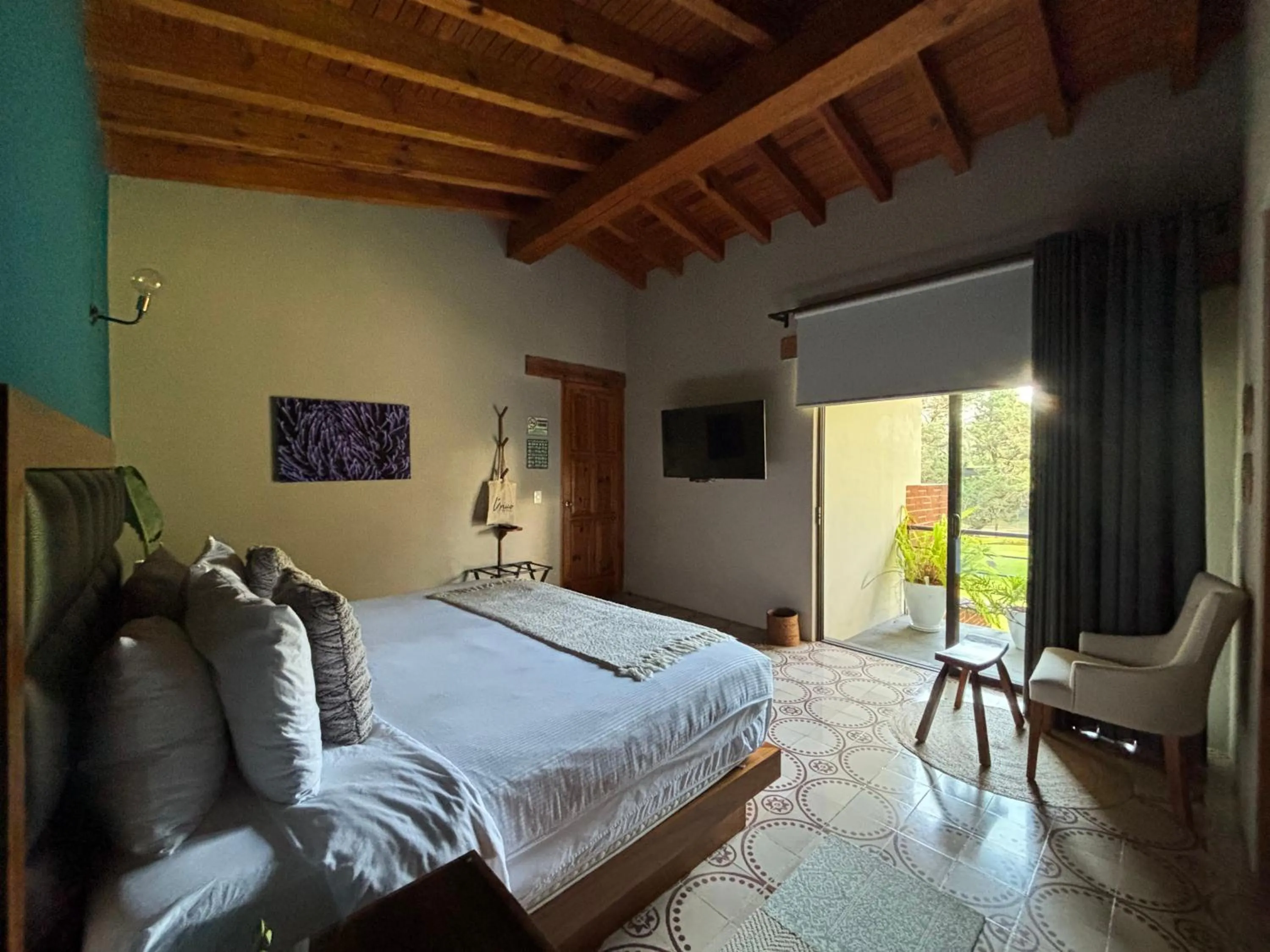Photo of the whole room, Bed in Hotel Boutique Unico Avandaro