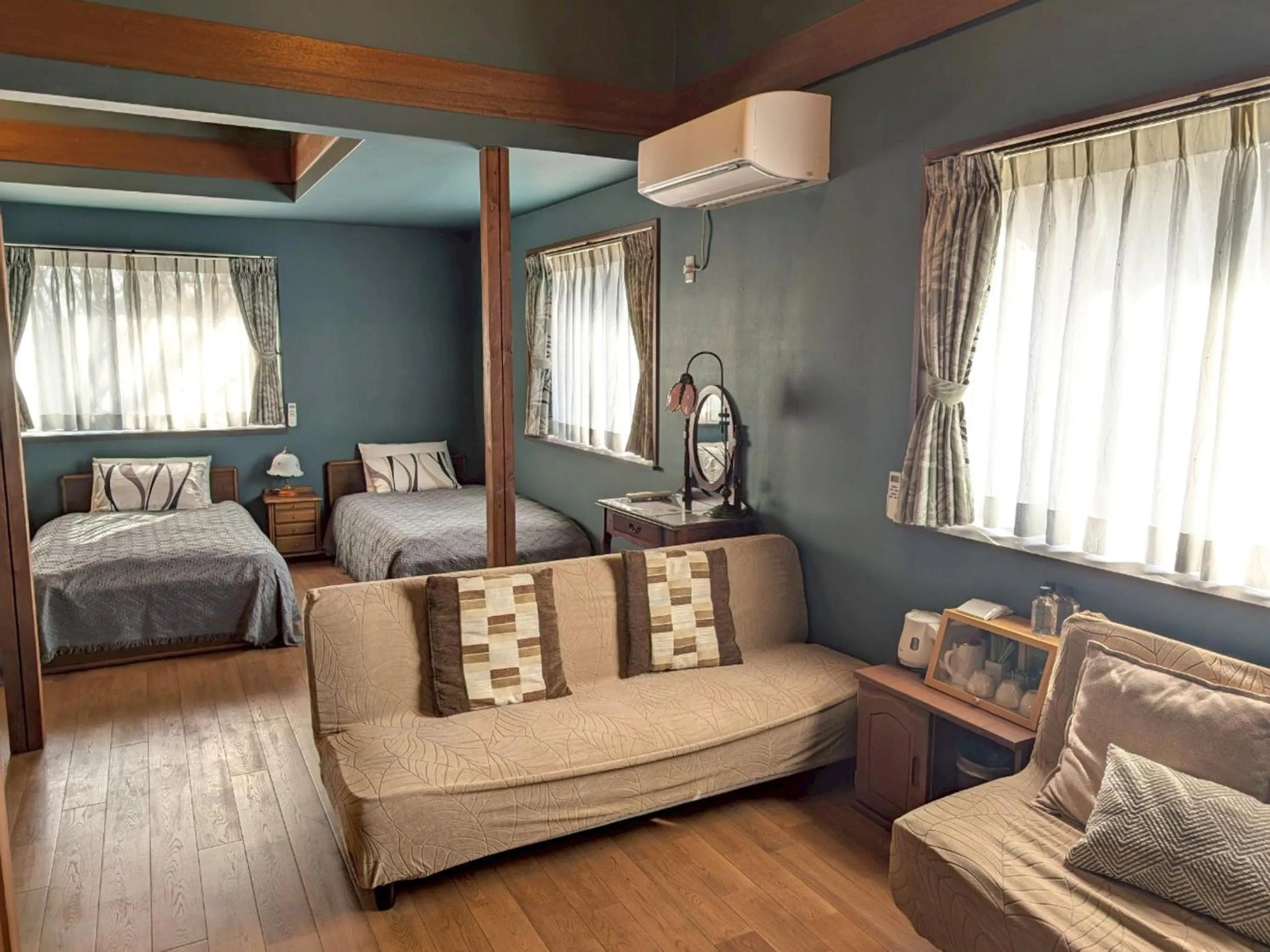 Living room, Bed in Pension Green Lake