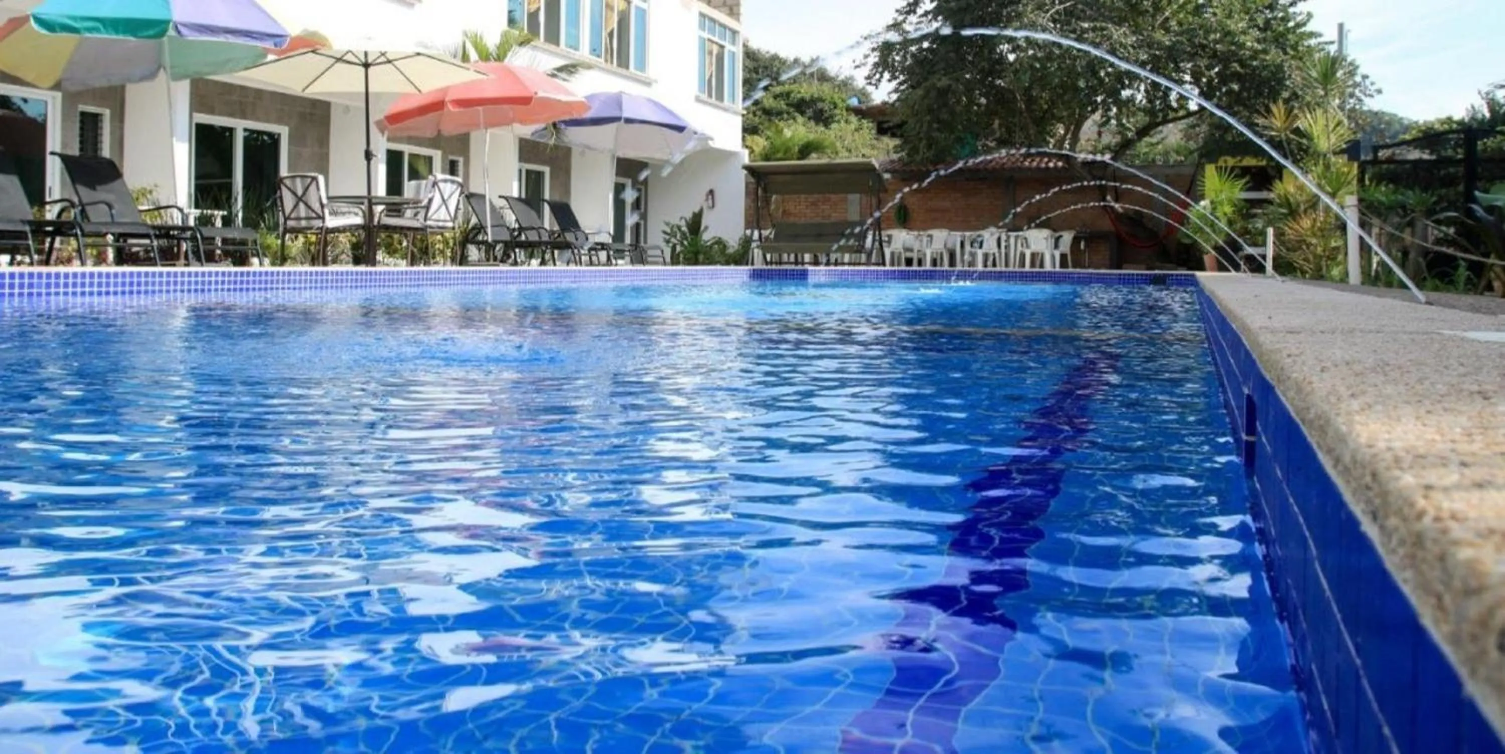 Swimming pool in Hotel Rega Suites Guayabitos - Family & Kitchen