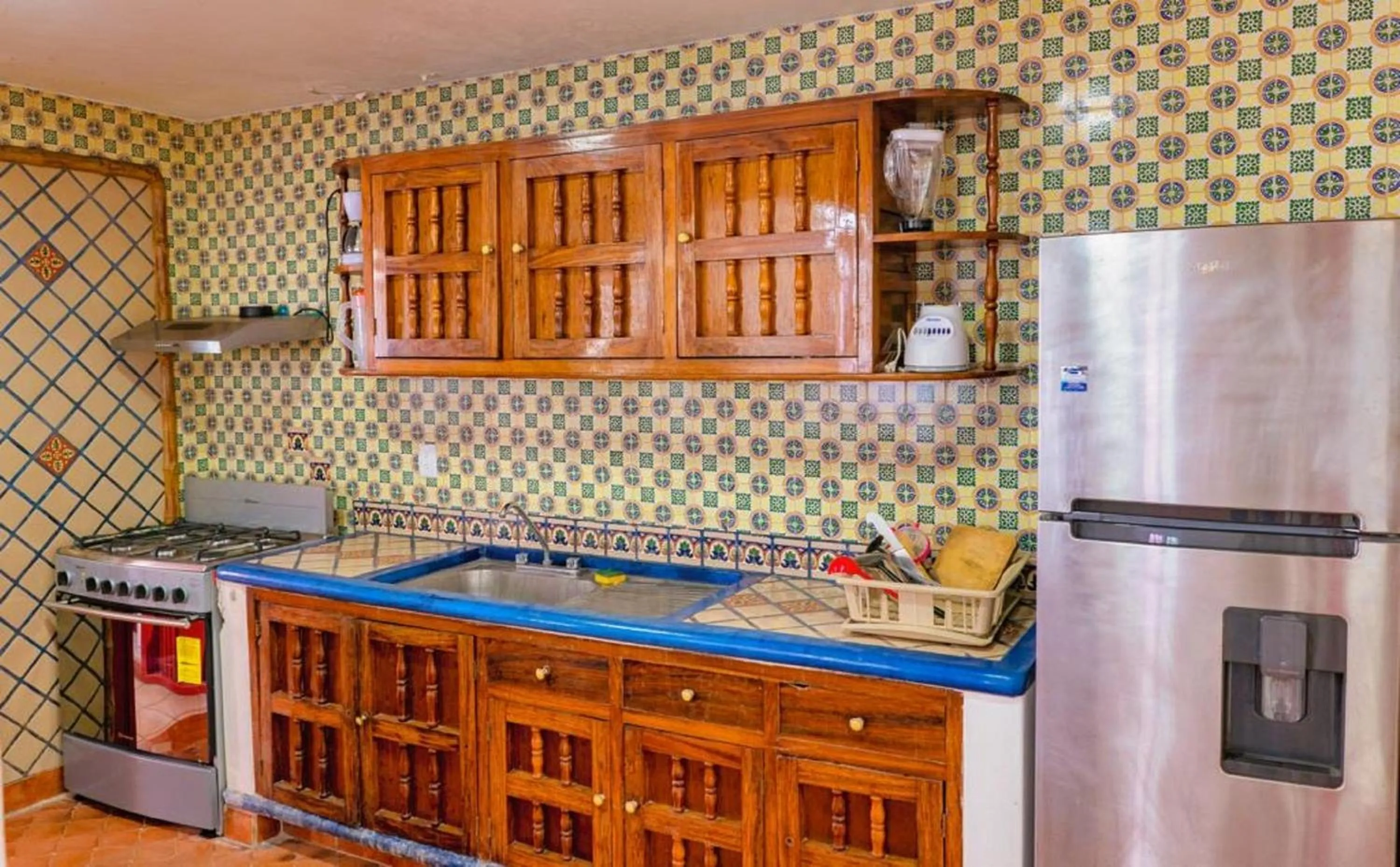 Kitchen or kitchenette in Hotel Rega Suites Guayabitos - Family & Kitchen