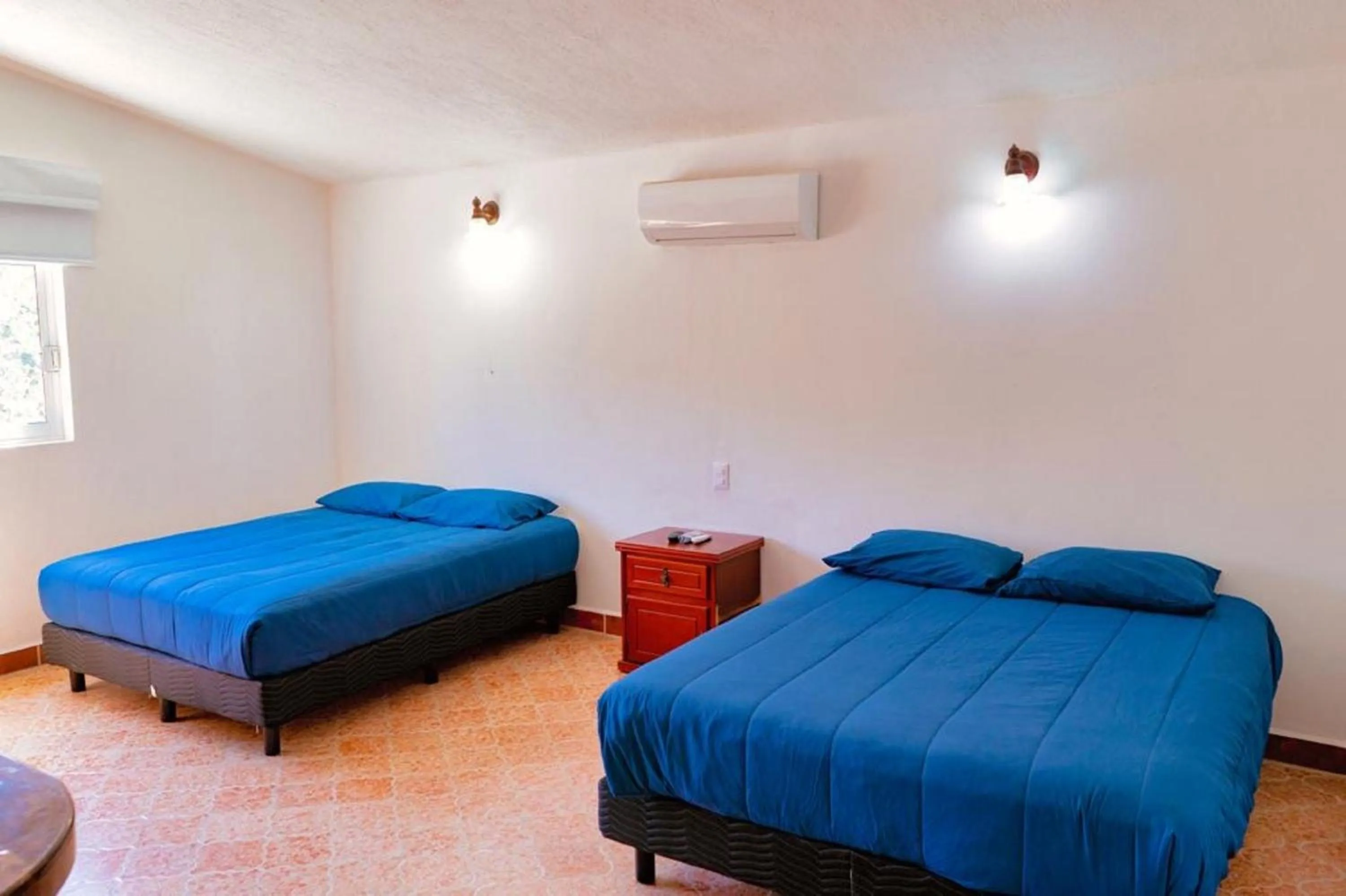 Bedroom, Bed in Hotel Rega Suites Guayabitos - Family & Kitchen