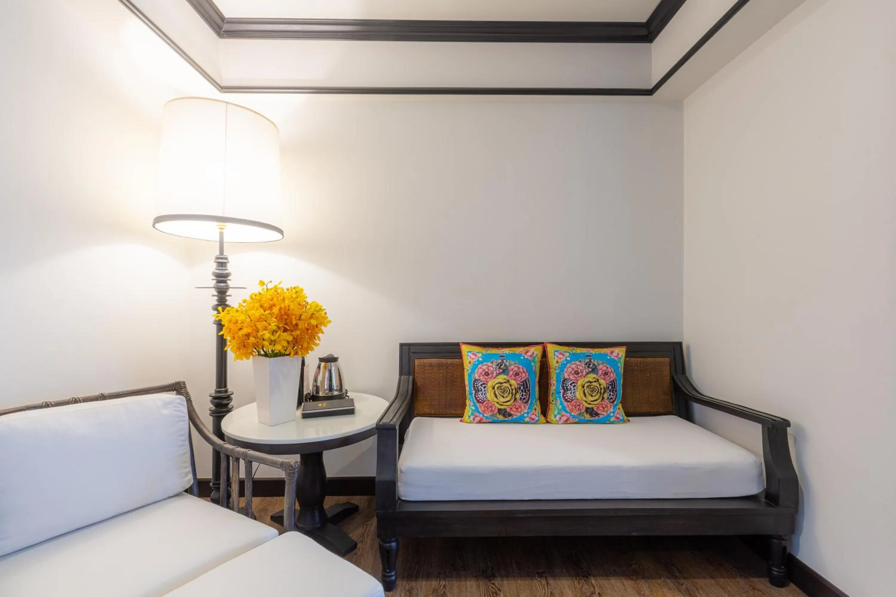 Seating area, Bed in MORA Boutique Hotel