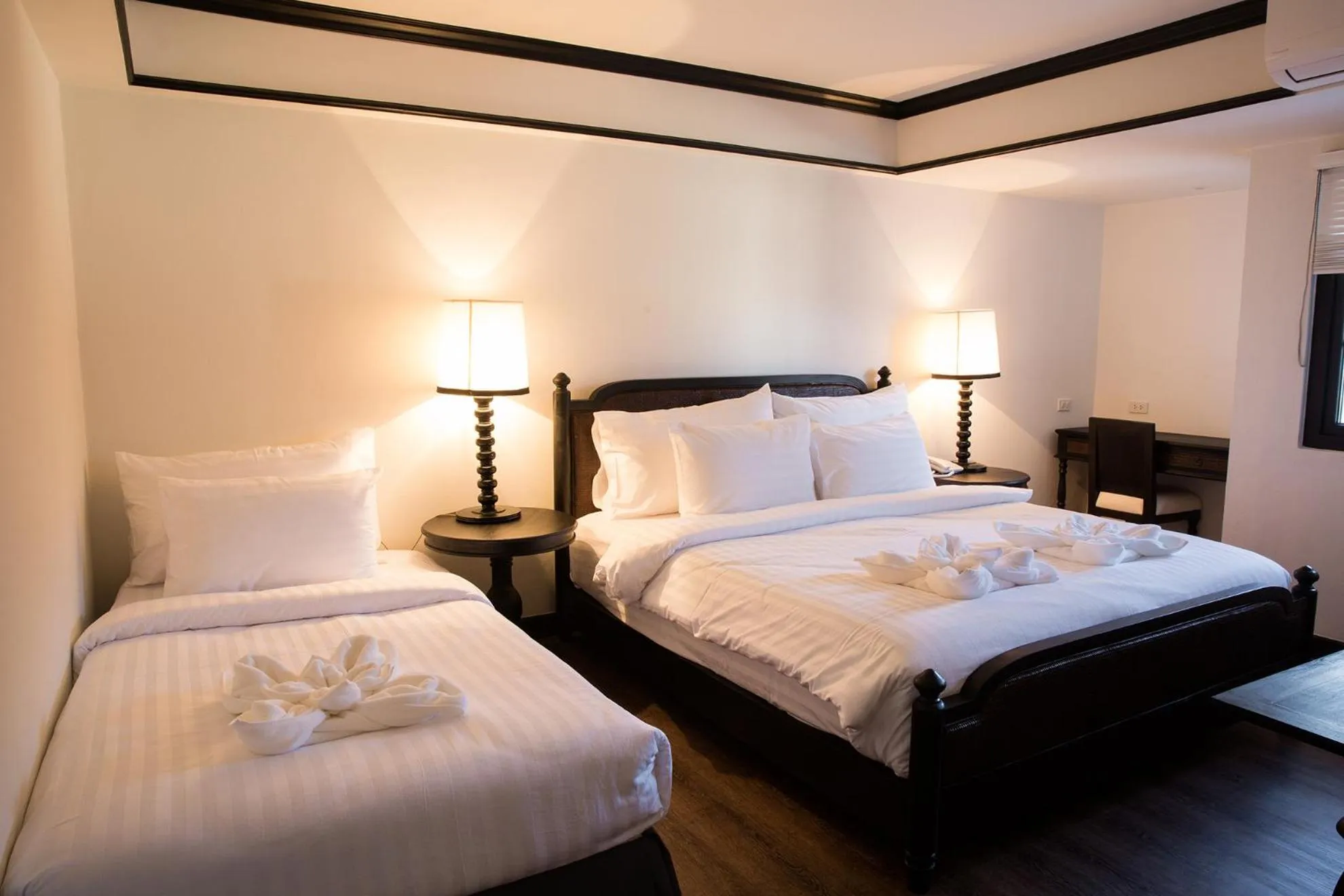 Bed in MORA Boutique Hotel