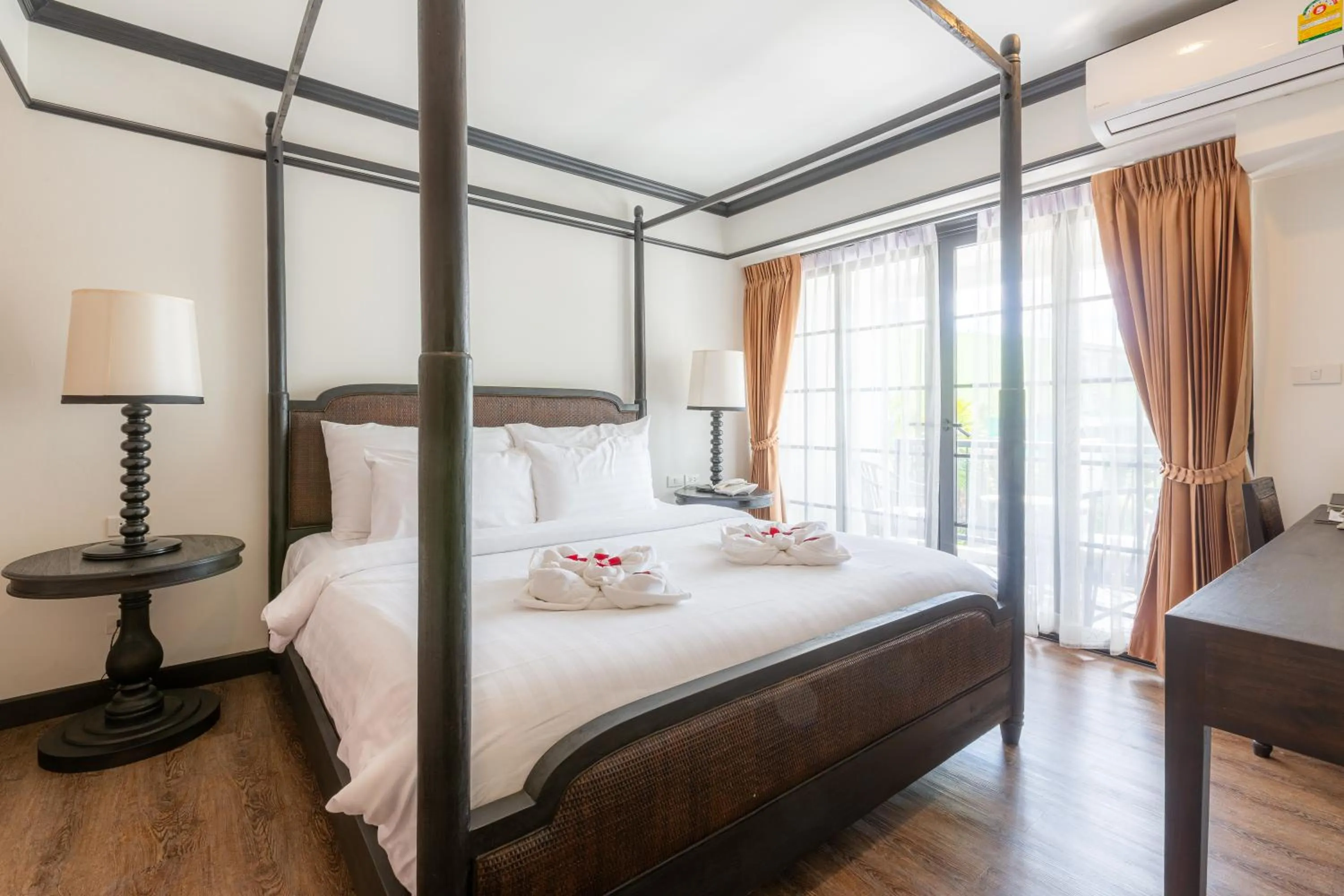 Bed in MORA Boutique Hotel