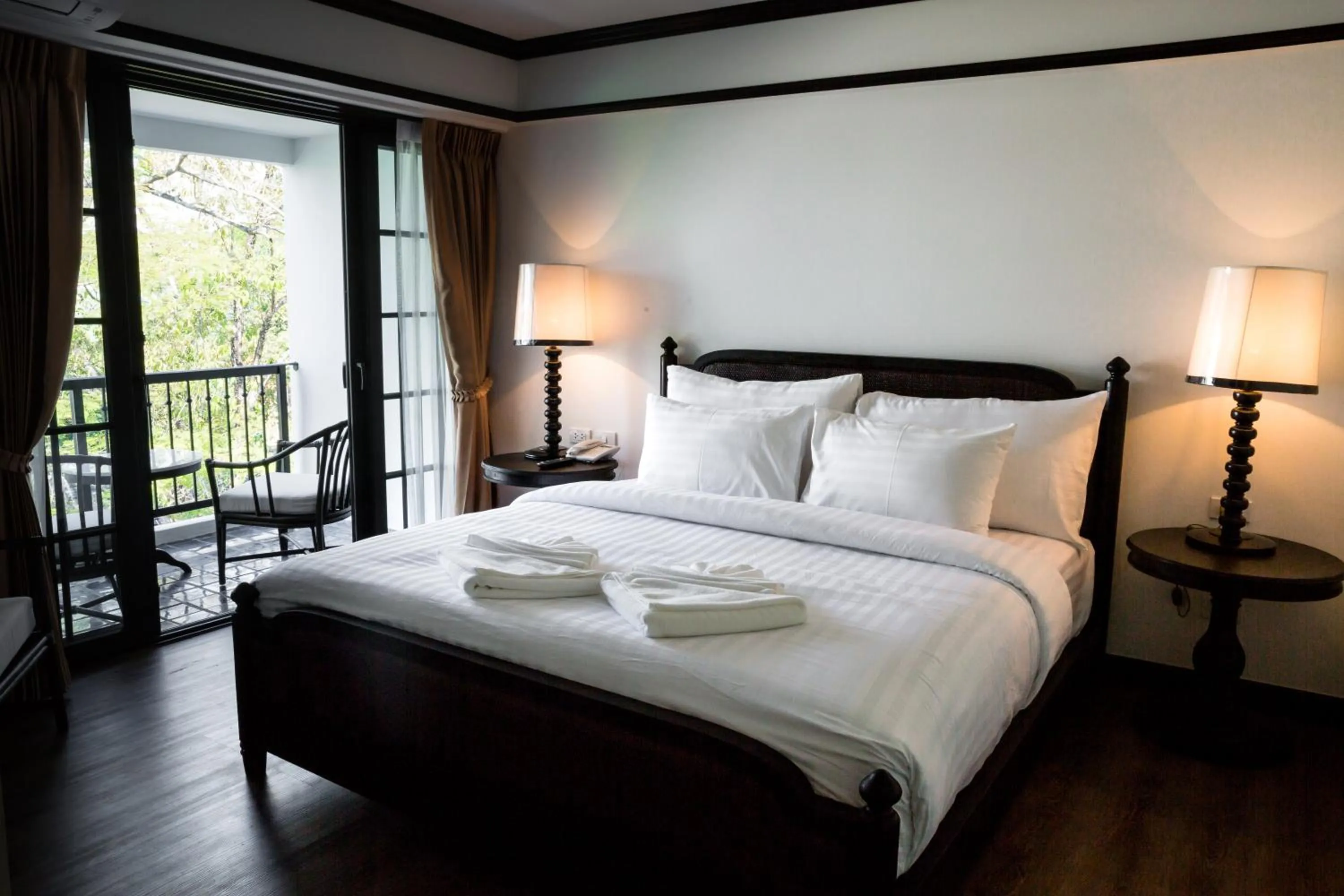 Bed in MORA Boutique Hotel