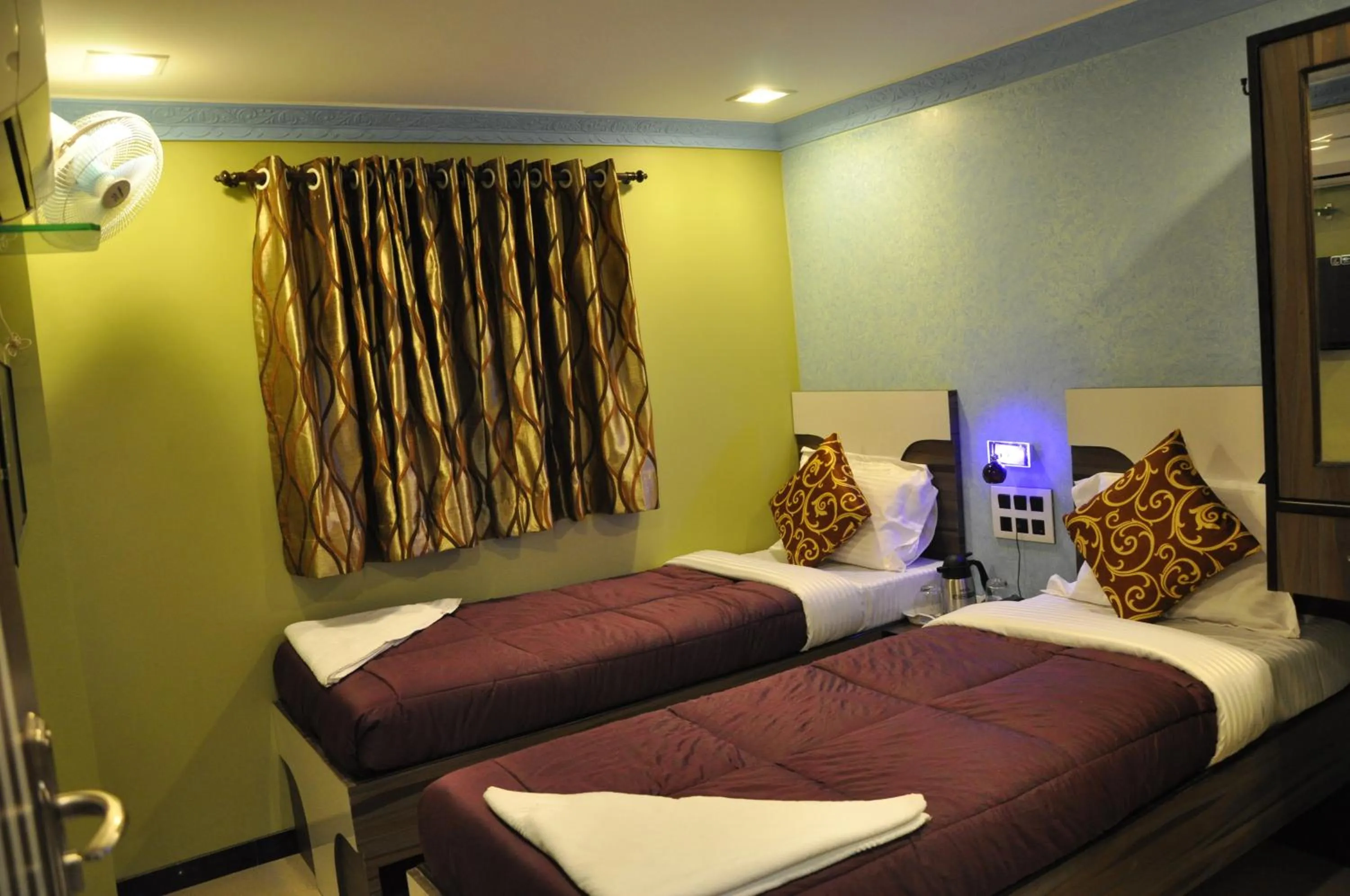 Bed in Hotel Planet Plaza