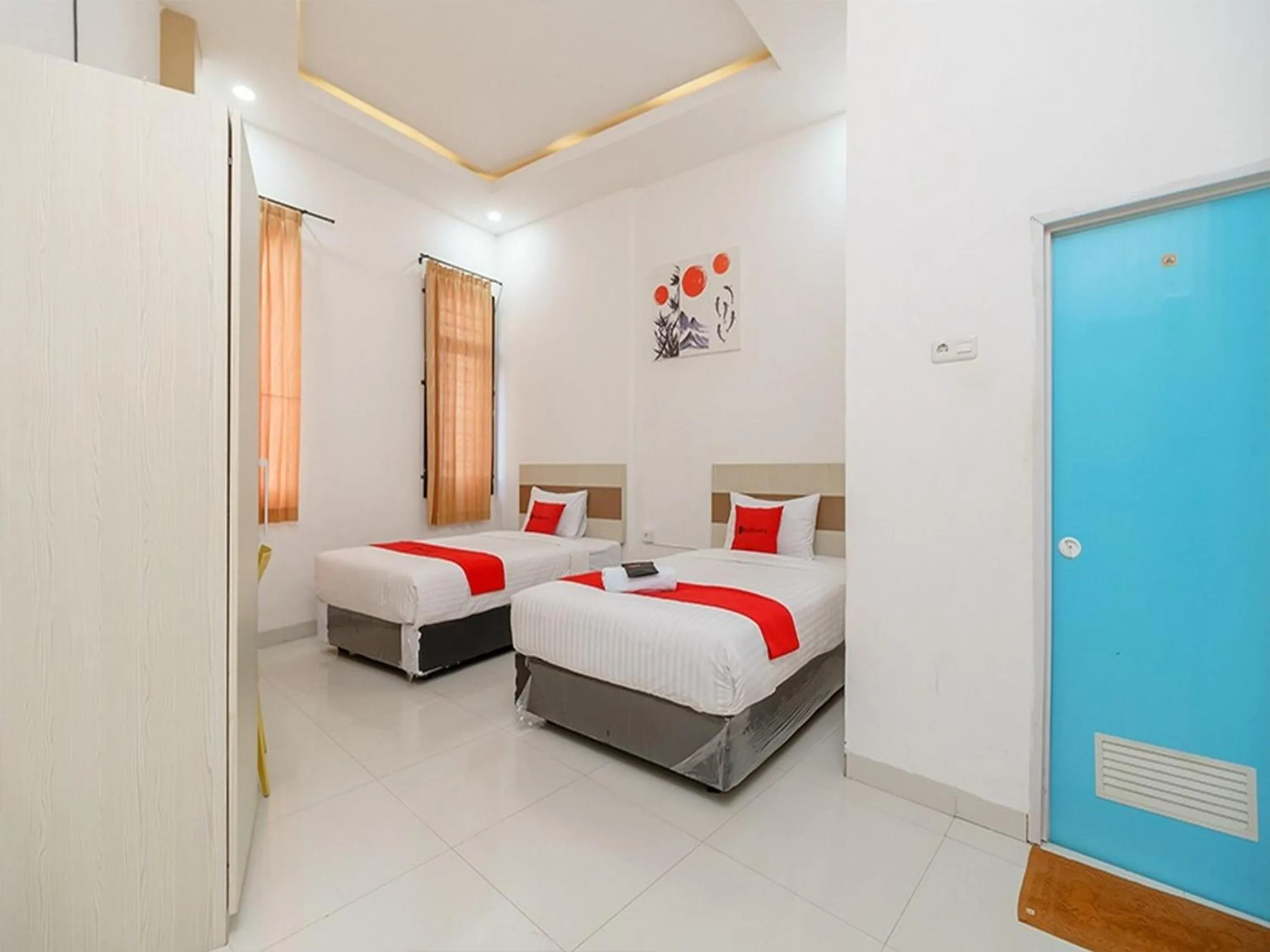 Bedroom, Bed in RedDoorz at Tara Homestay Palembang