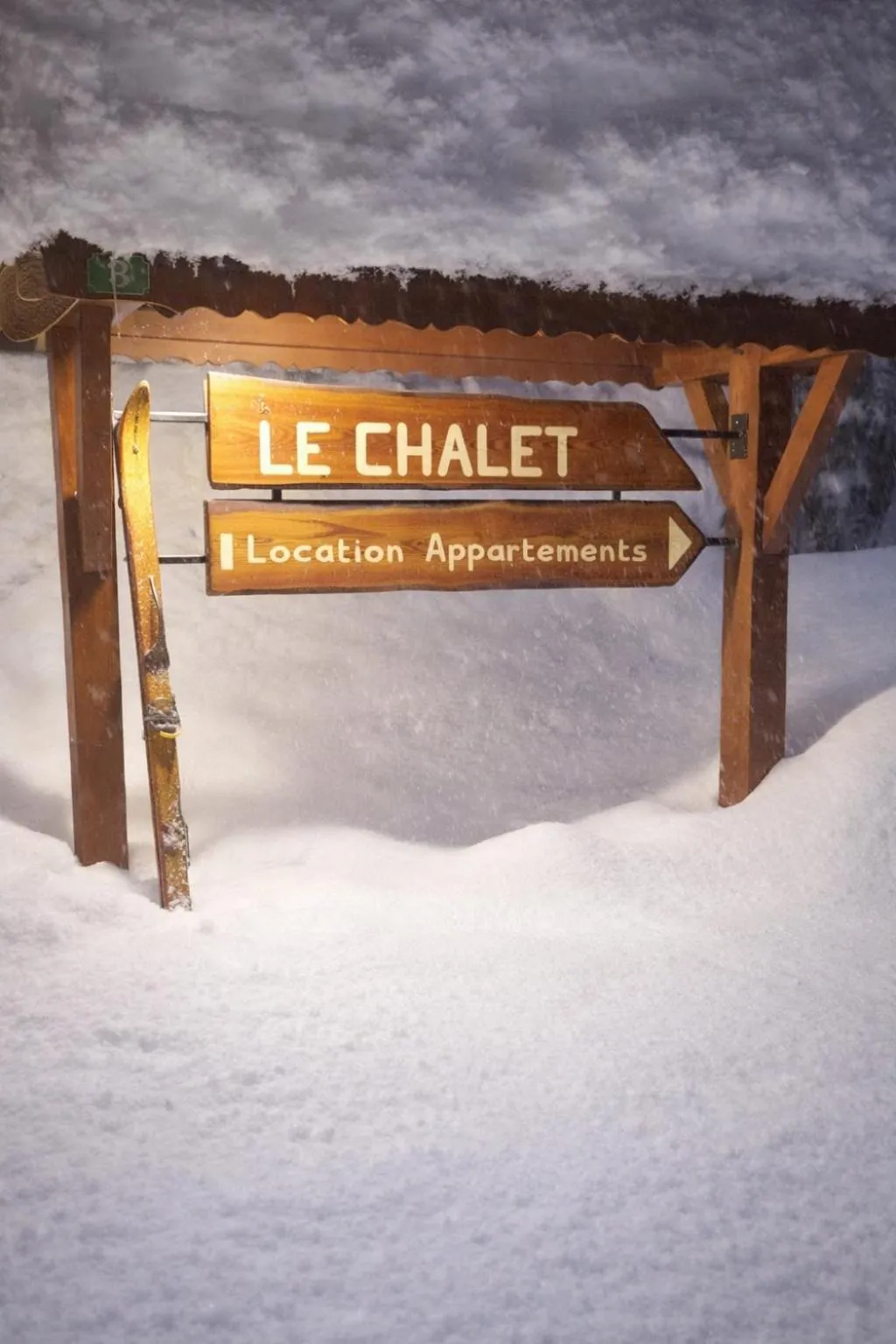 Property logo or sign in Le Chalet