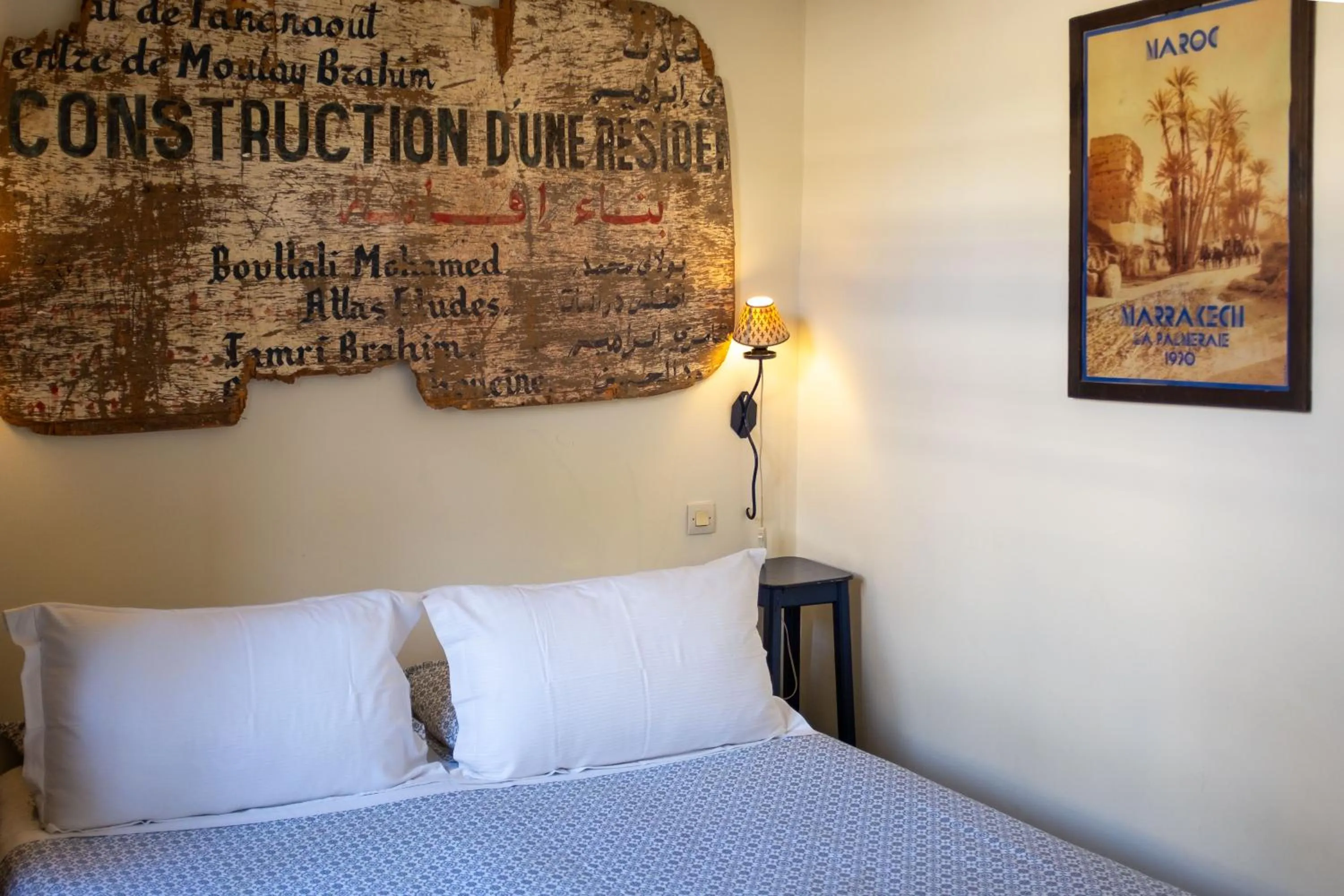 Bed in Riad Le Coq Berbère