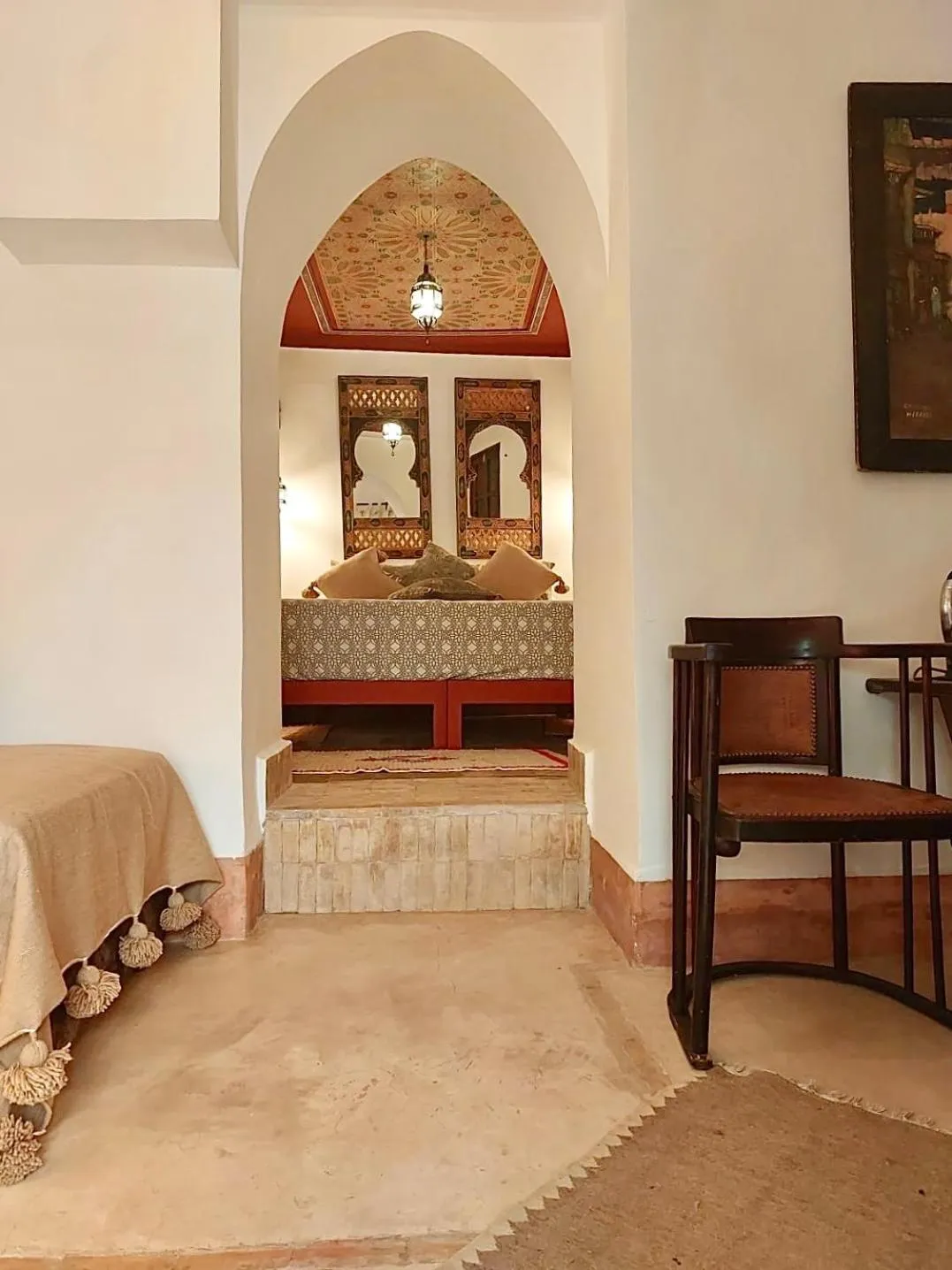 Bed in Riad Le Coq Berbère