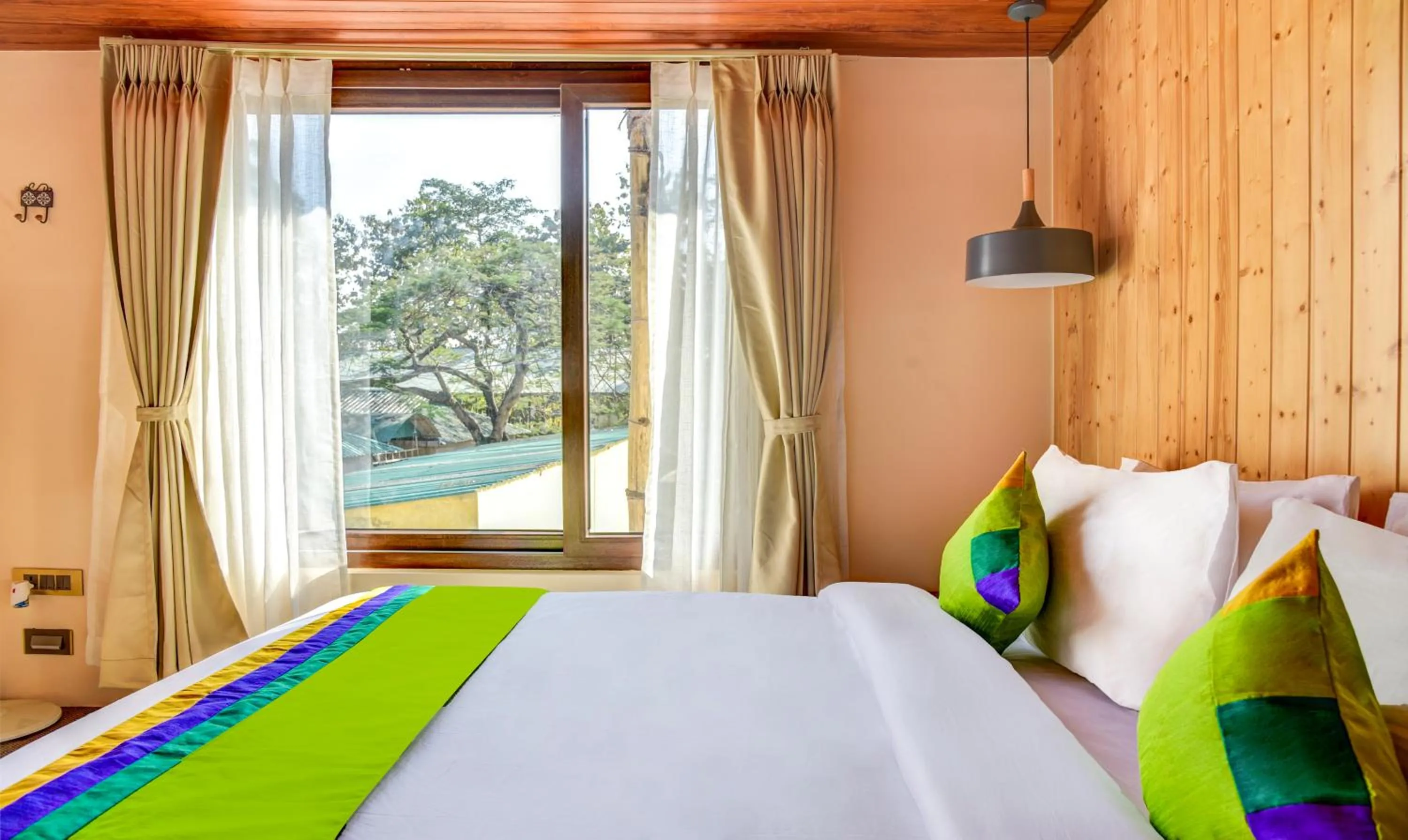 Bedroom, Bed in Treebo Premium Blue Mountain Country Club And Resort