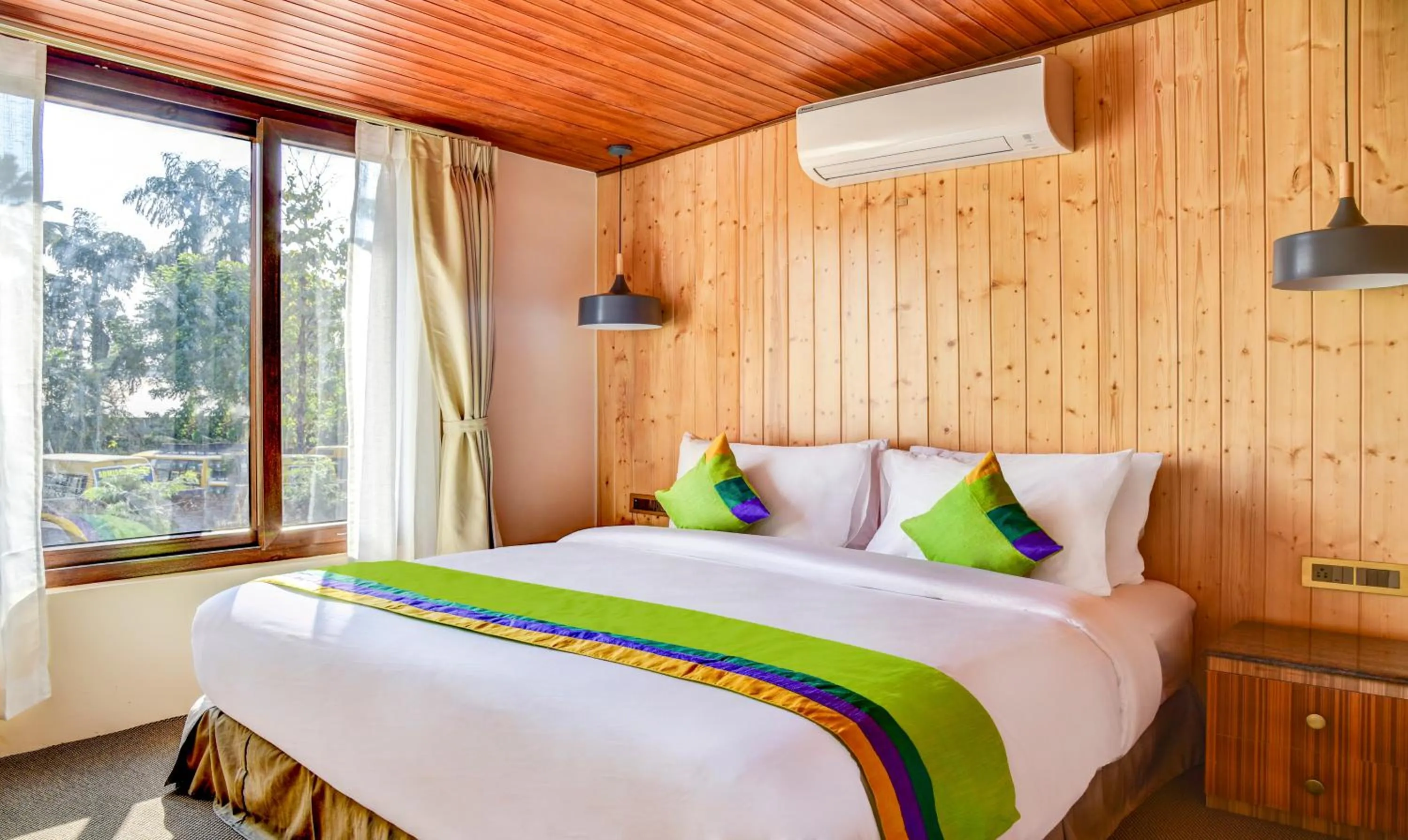 Bedroom, Bed in Treebo Premium Blue Mountain Country Club And Resort