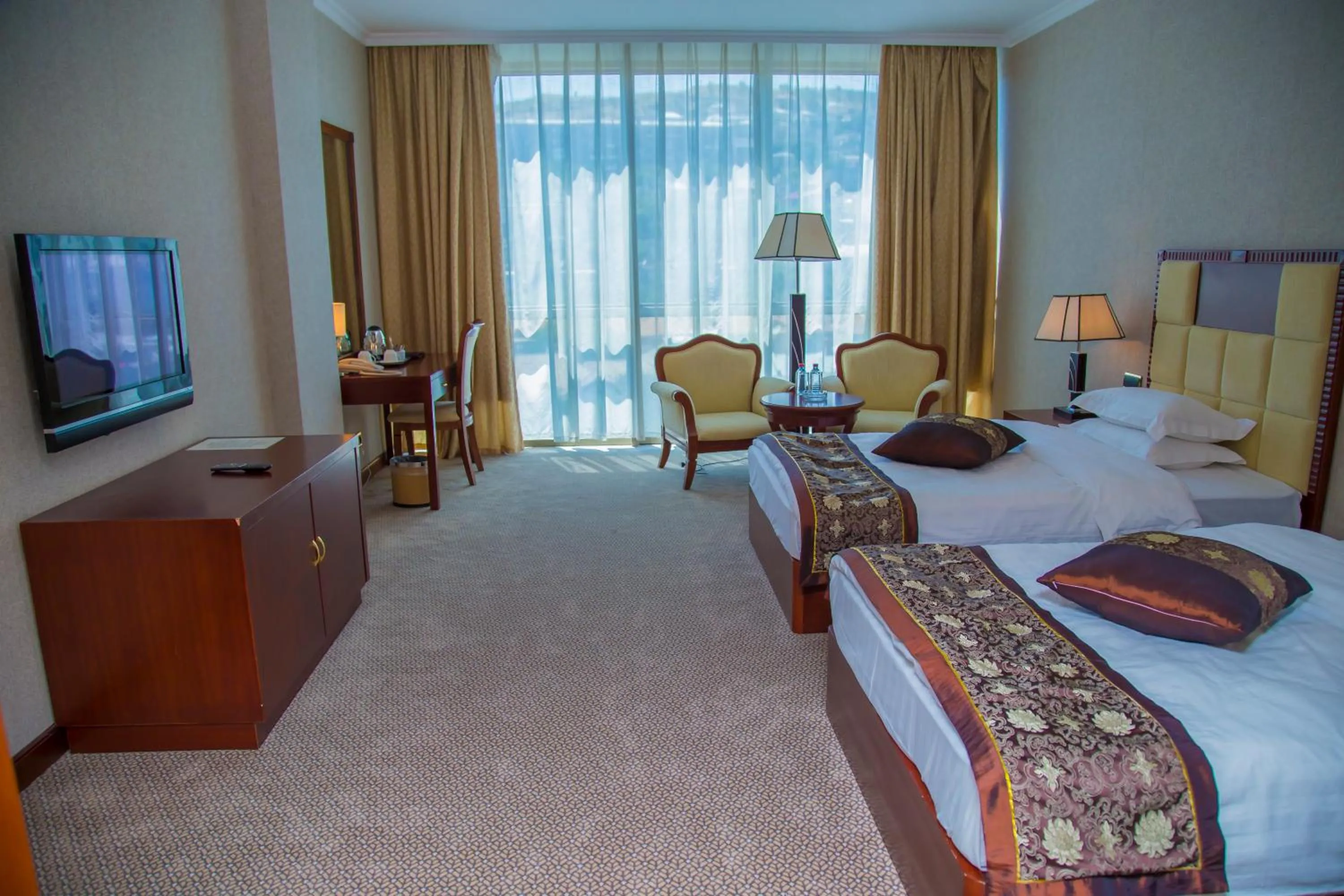 Photo of the whole room, Bed in Golden Coast Hotel