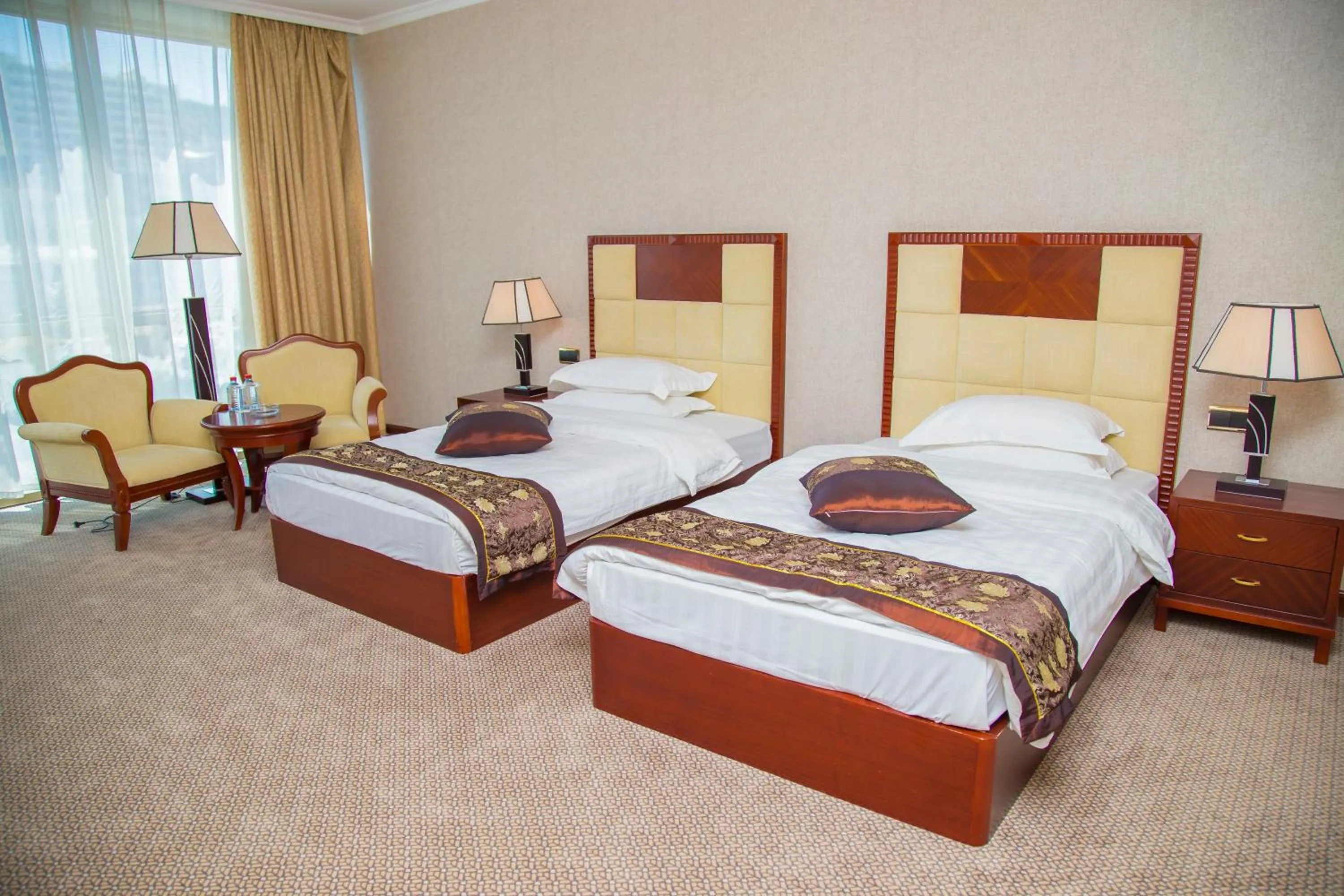 Bed in Golden Coast Hotel
