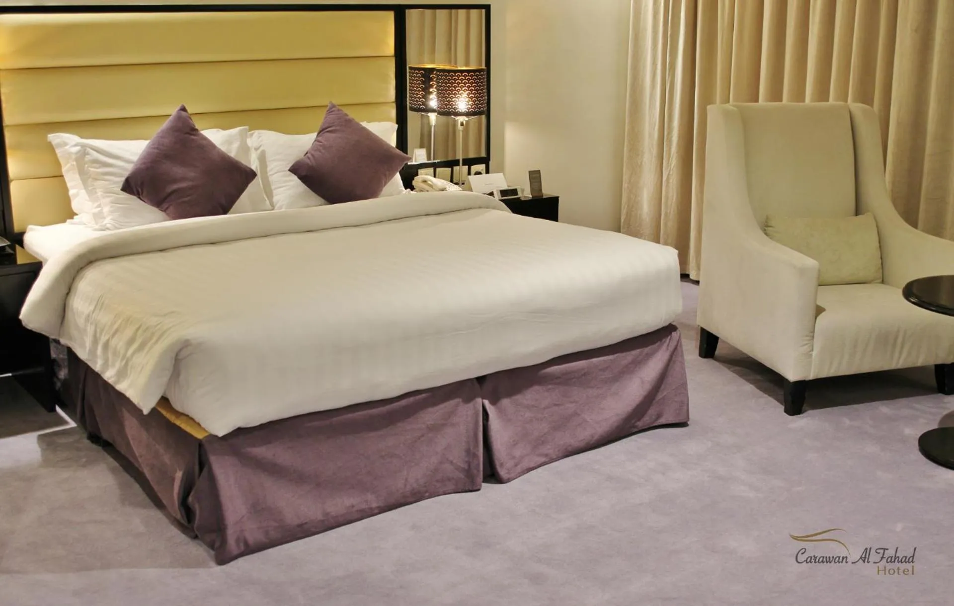 Bed in Carawan Al Fahad Hotel