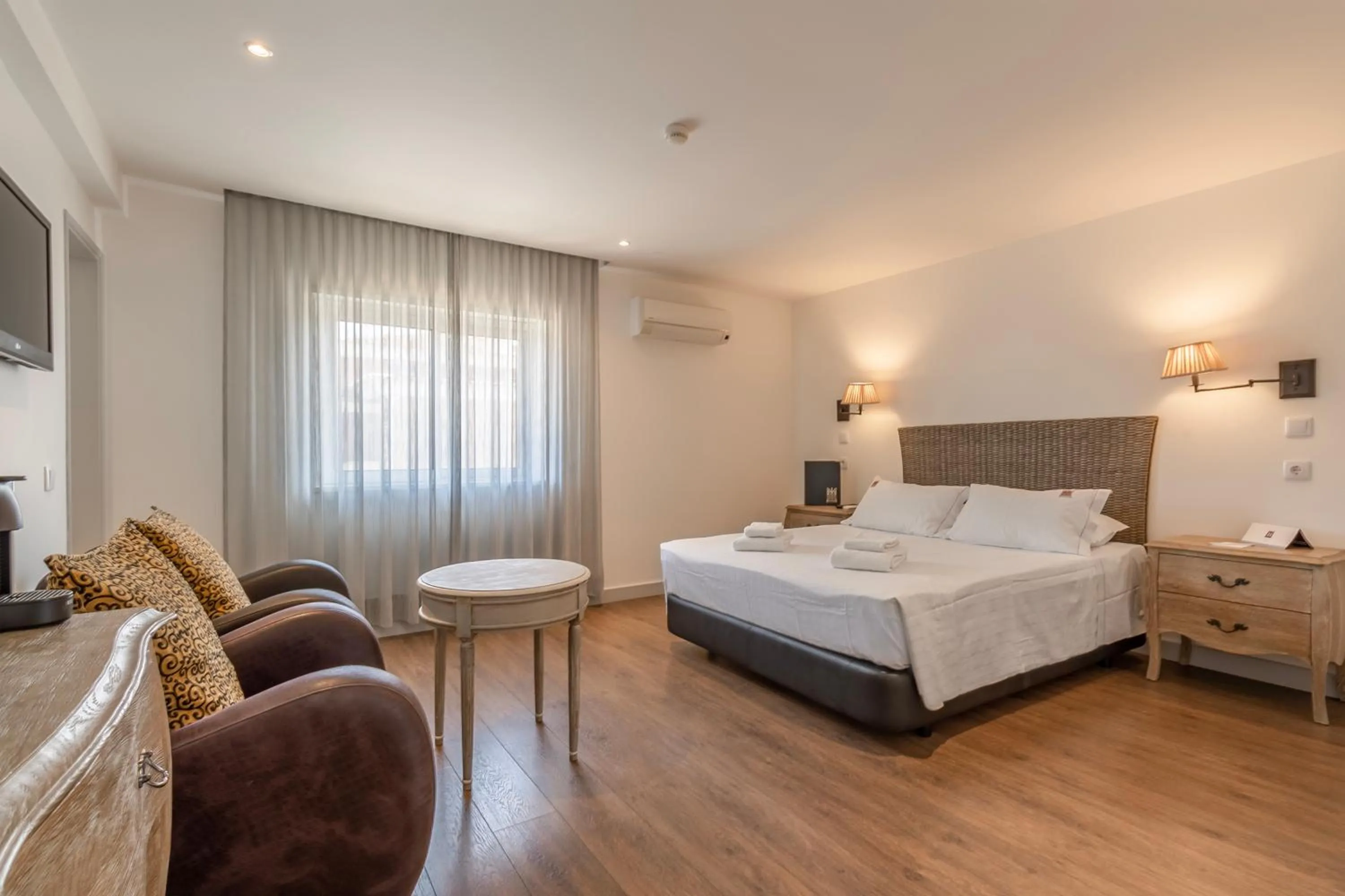 Bed in Charming Residence & Guest House Dom Manuel I Adults only