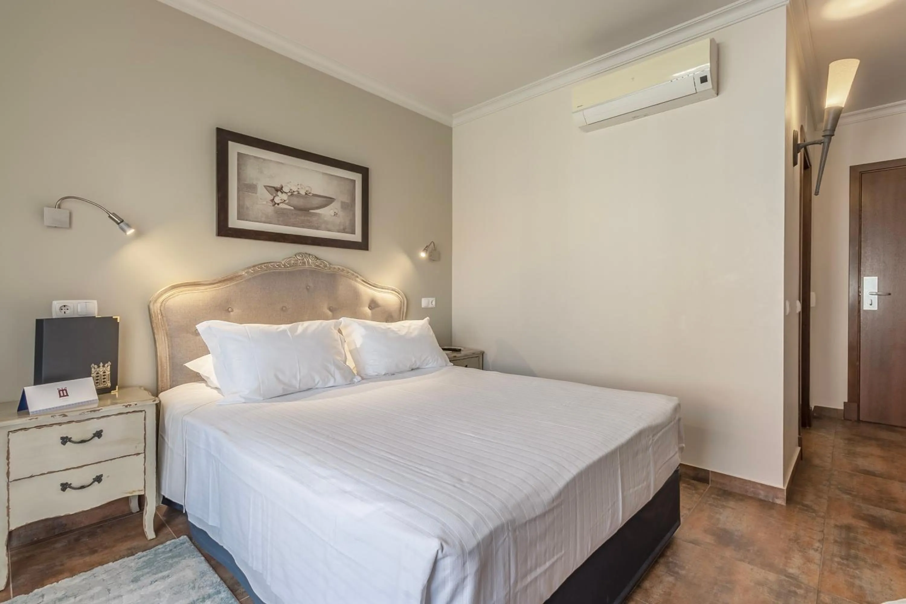 Bed in Charming Residence & Guest House Dom Manuel I Adults only