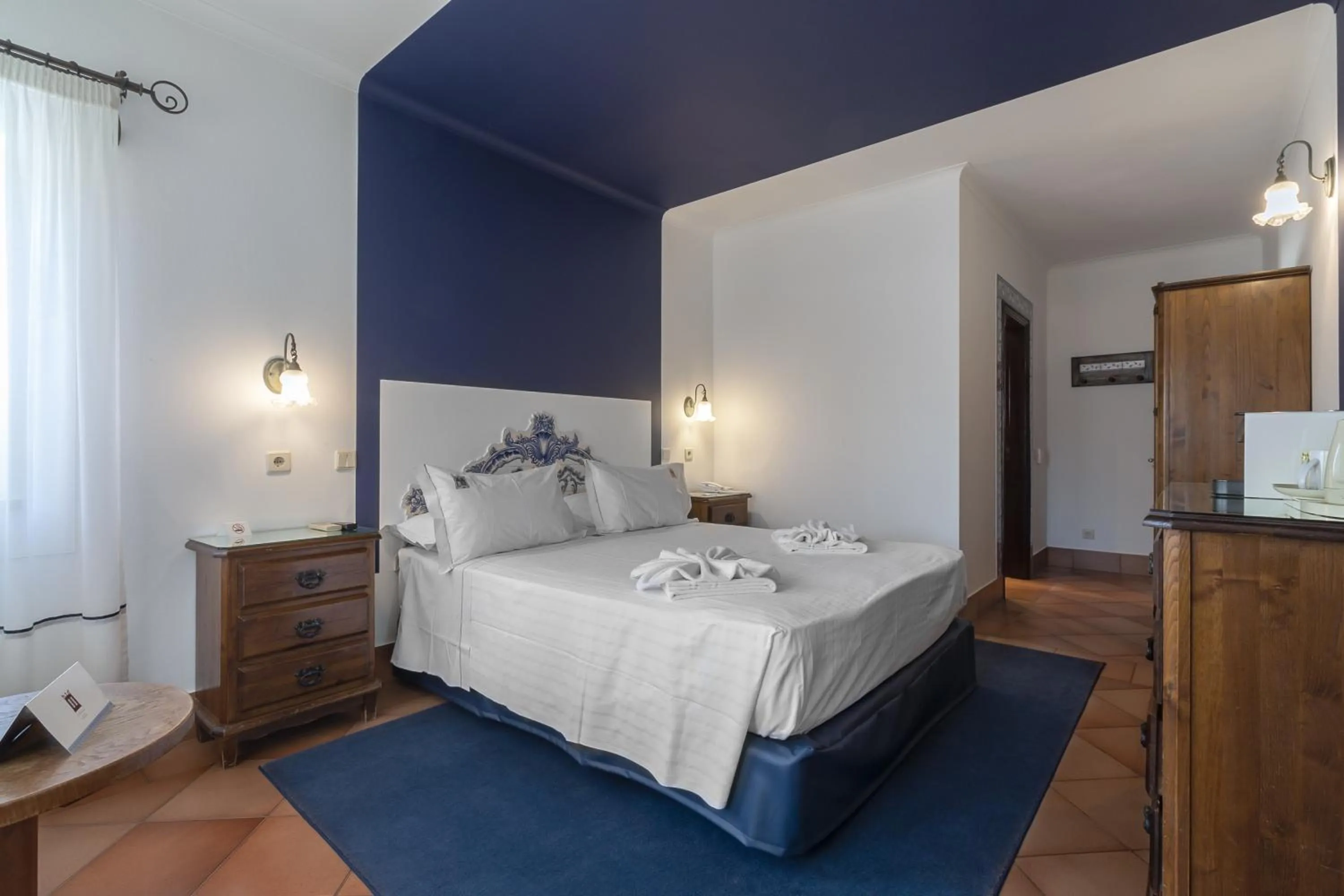 Bed in Charming Residence & Guest House Dom Manuel I Adults only