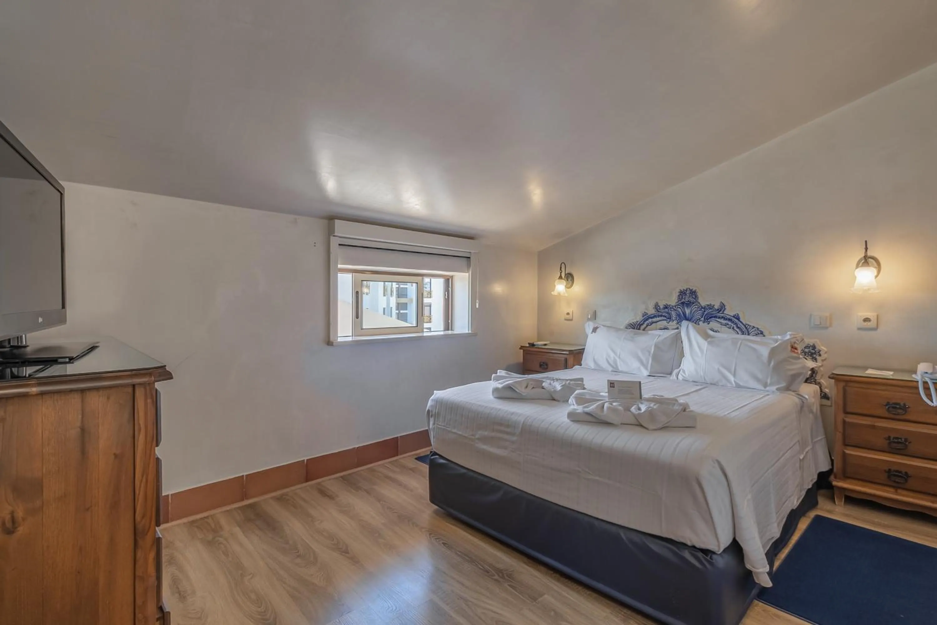 Bed in Charming Residence & Guest House Dom Manuel I Adults only