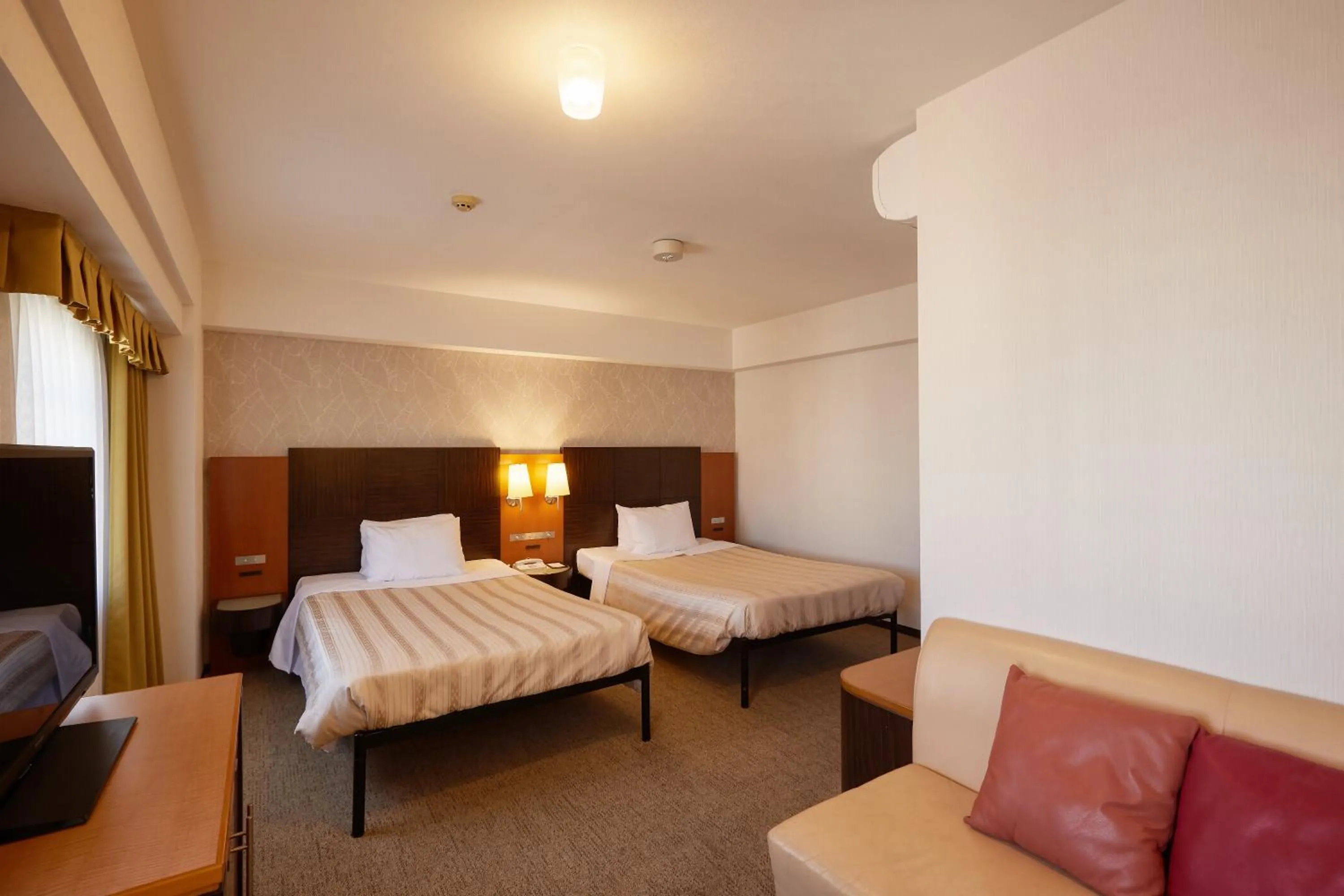 Bed in GRG Hotel Naha Higashimachi